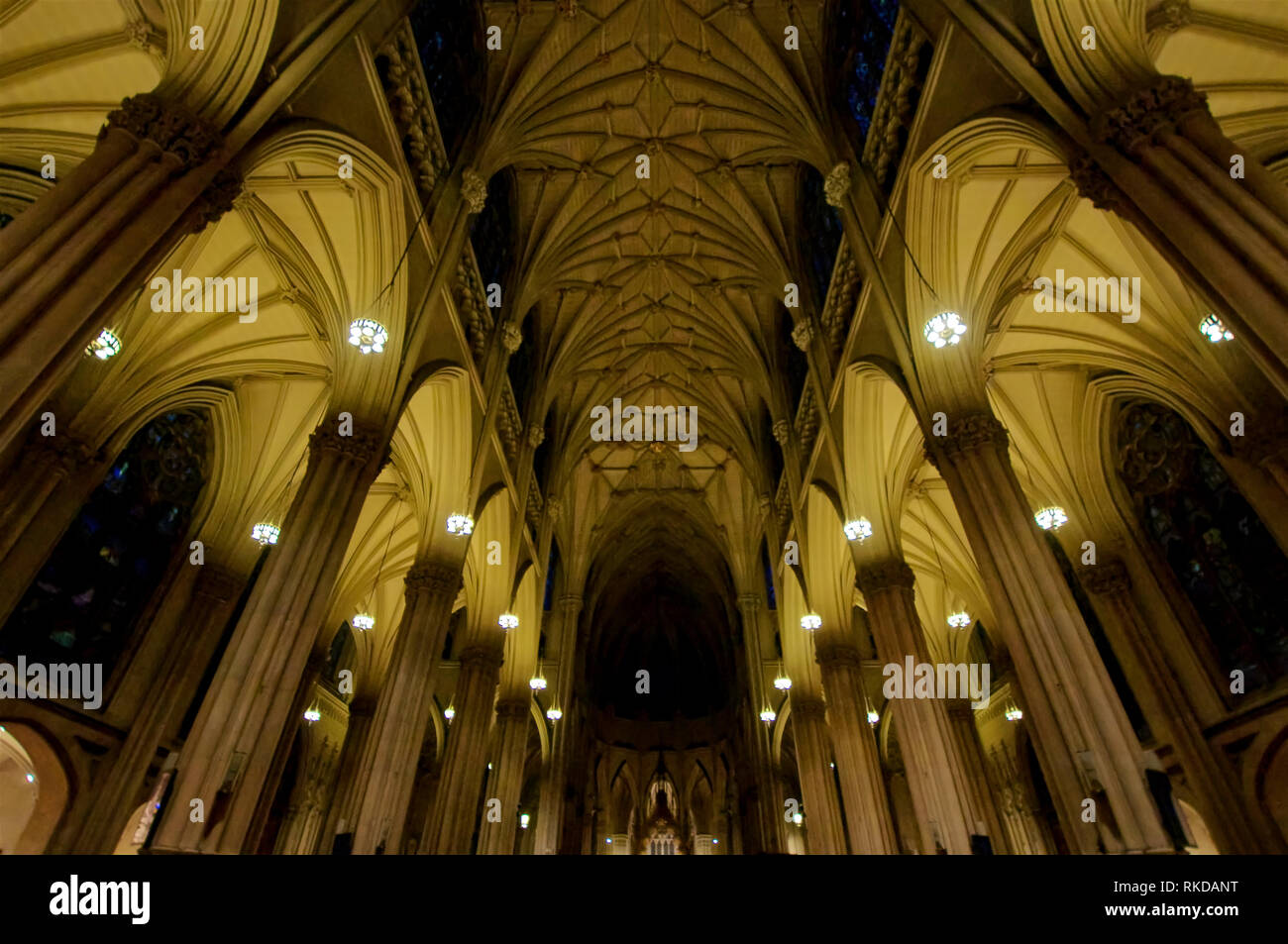 The vaulted ceiling of St. Patrick's Cathedral, a Catholic church, on 5th Avenue in New York, New York. Stock Photo