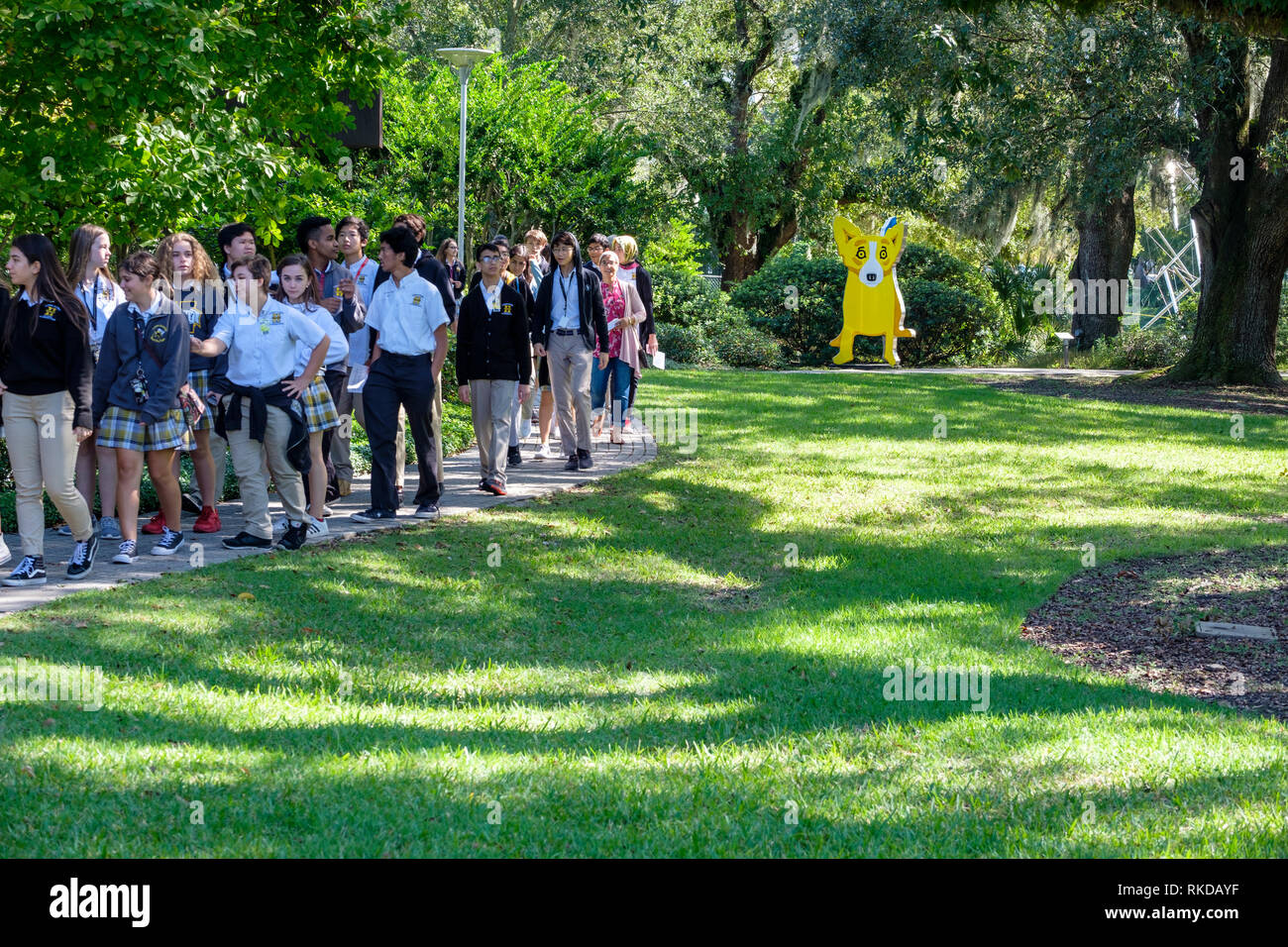 Kids, students on school trip to New Orleans Sculpture Garden, George Rodrigue We Stand Together sculpture, New Orleans, Louisiana, USA Stock Photo