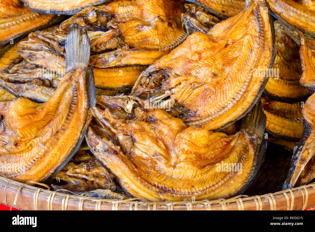 An arrangement of dried freshwater fish or pla haeng at a local fresh fish market in Bangkok, Thailand. Stock Photo