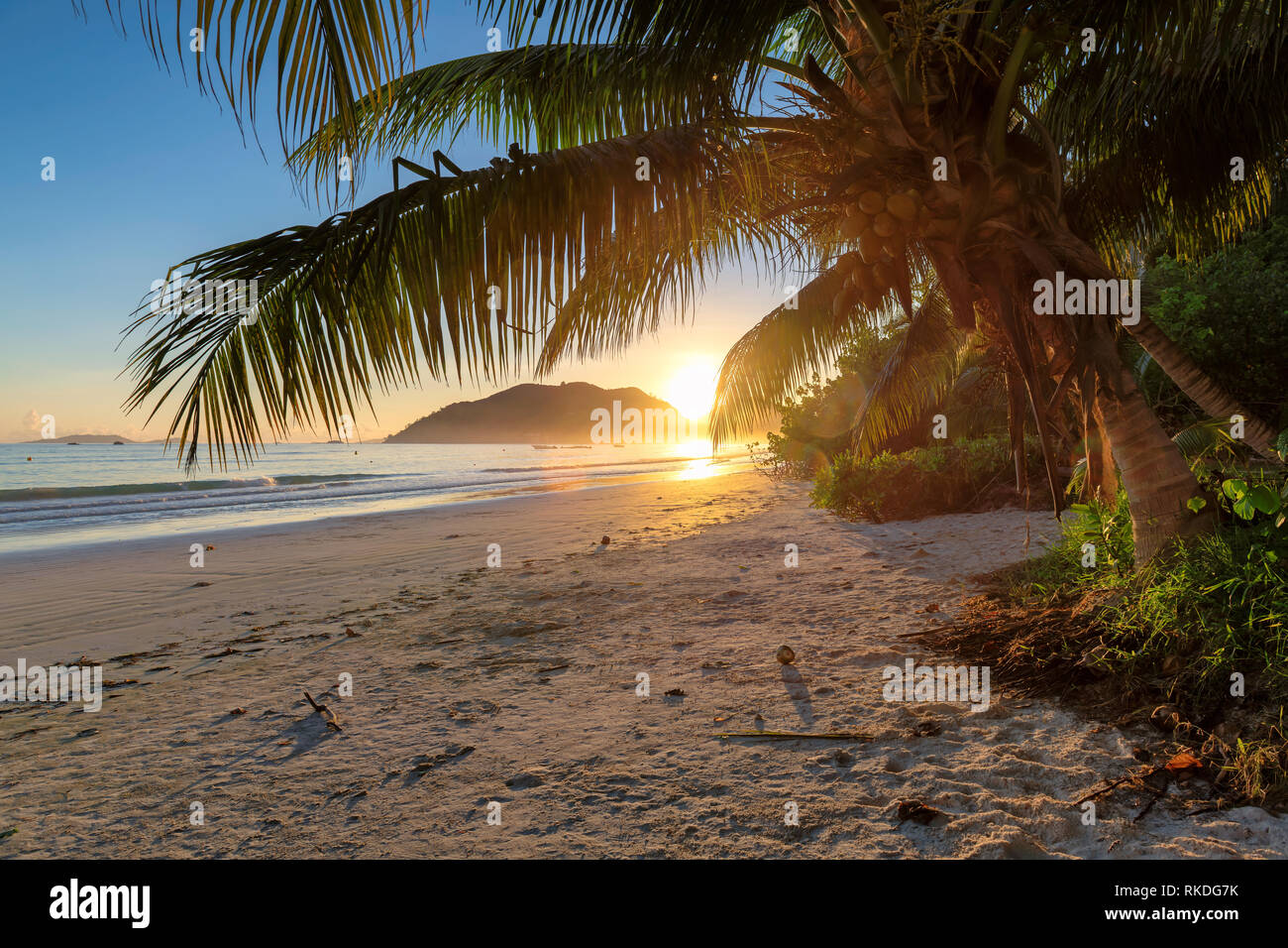 Beautiful sunrise over the tropical beach Stock Photo