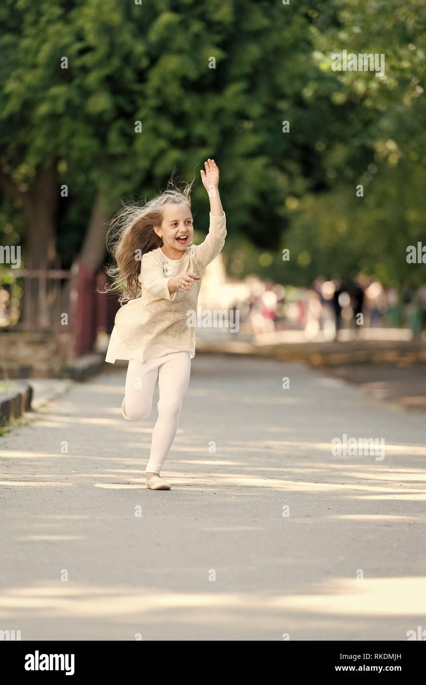 Happy Girl Run In Summer Park Small Child Smile With Flying Hair