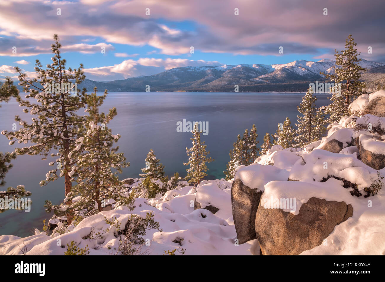 Lake Tahoe after a winter snow storm at sunset, Lake Tahoe State Park, Nevada, United States. Stock Photo