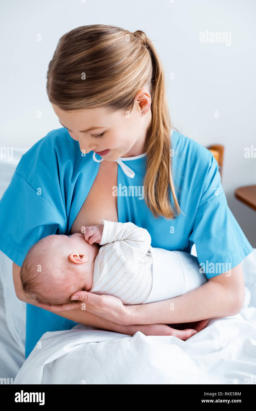 Mother breast feeding her baby Stock Photo - Alamy