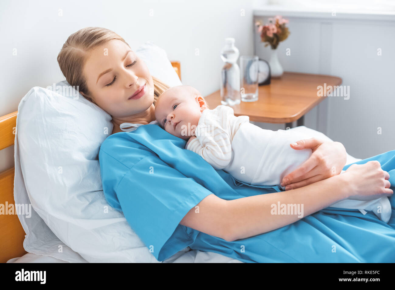 Baby sleeping on chest hires stock photography and images Alamy
