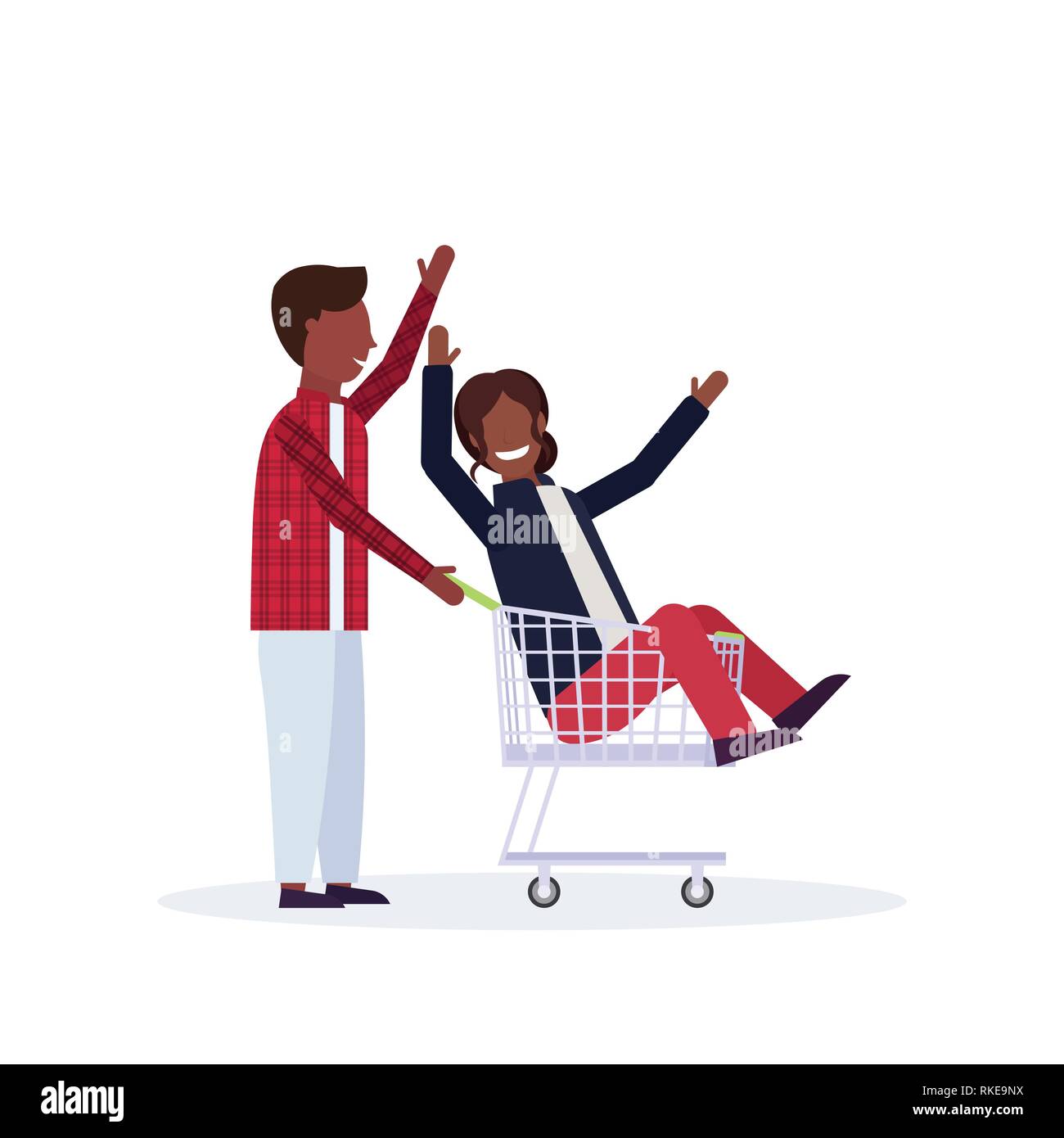 man carrying trolley cart with woman happy african american couple