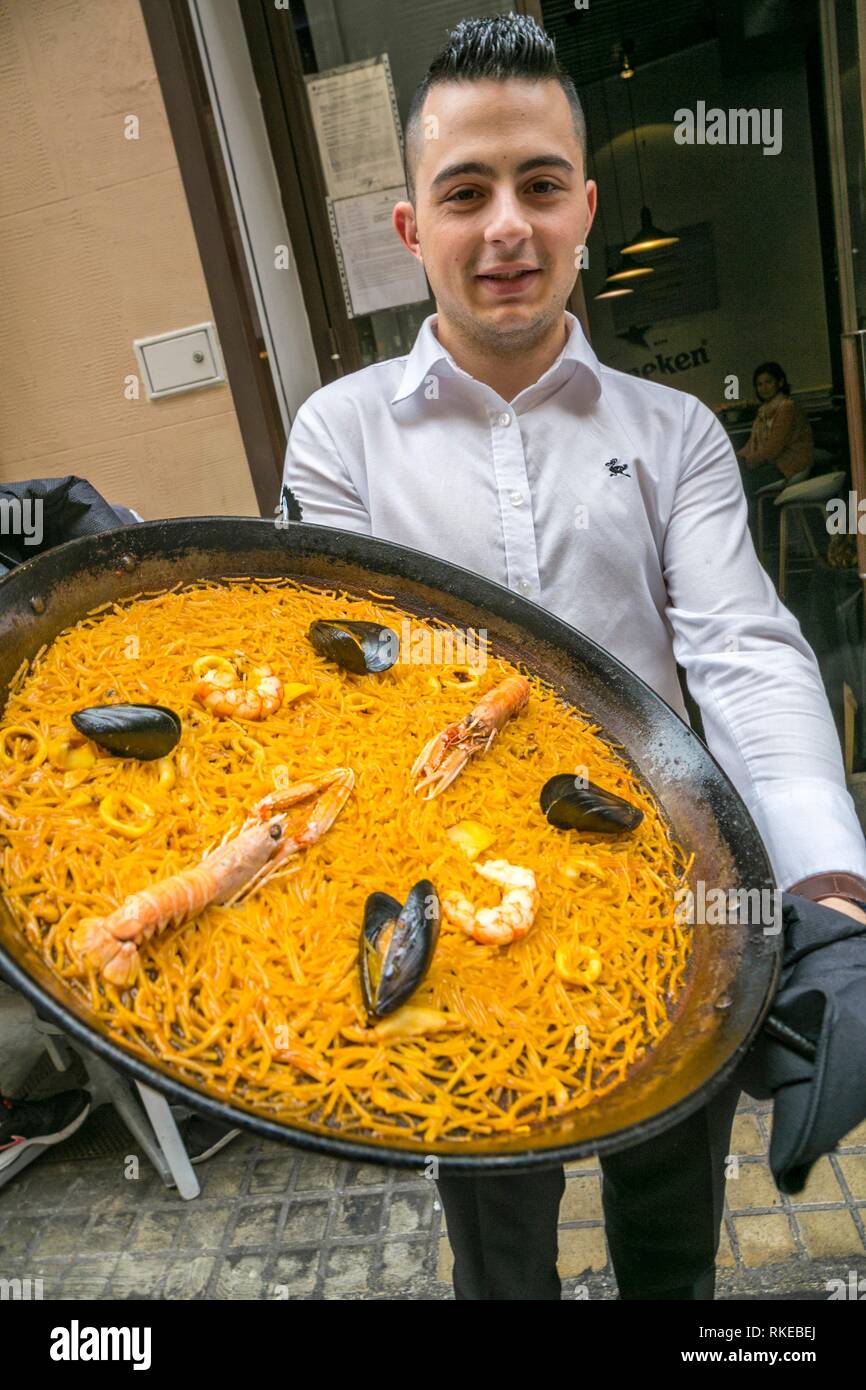 Paella typical dish. Lotelito rooms and bar. Valencia. Comunidad