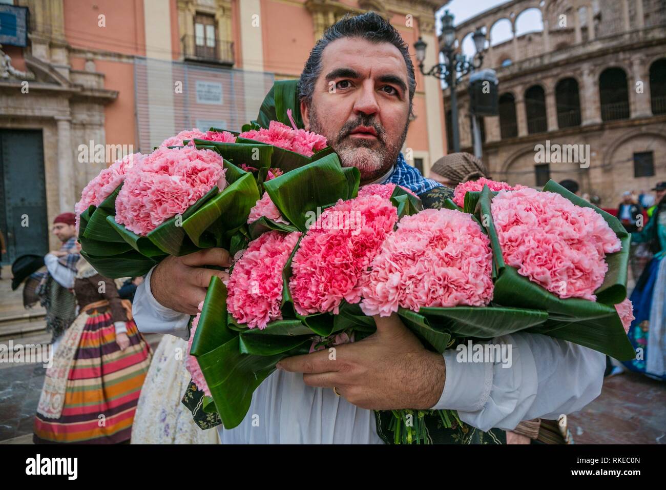 Fallas festival. Fallero in traditional dress. Parade to the Plaza de la Virgin in order to make an offering of flowers to Our Lady of the Forsaken, Stock Photo
