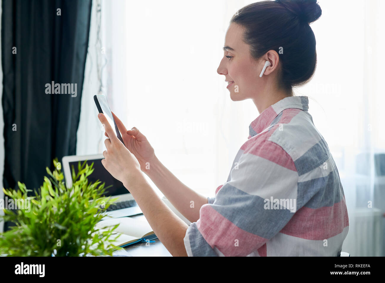 Woman Using Mobile Phone Stock Photo
