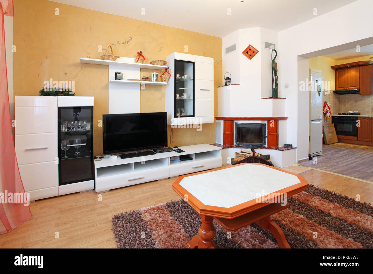 Beautiful living room with fireplace Stock Photo - Alamy