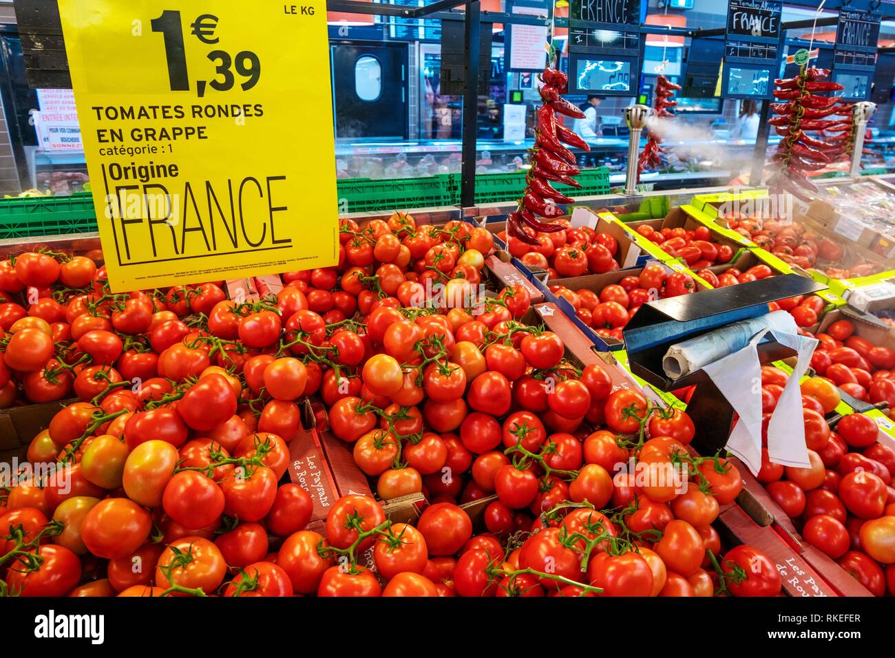 France, Occitanie, Lot, tomatoes from France, on a stand in a supermarket at Gondron. Stock Photo