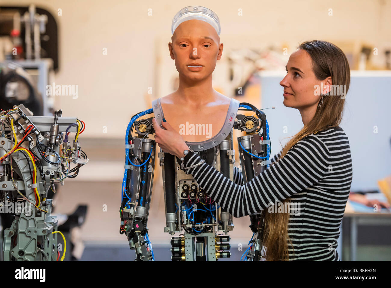 Penrith, Cornwall, UK. 07th Feb, 2019. Ai-da's 'skin' is test positioned on the shoulders of her body - The first humanoid robot artist Ai-Da being assembled at Engineered Arts, Cornwall ahead of her inaugural exhibition at Lady Margaret Hall on 8 May 2019. She is the brainchild of gallery owner and art specialist, Aidan Meller and he will also direct and curate the exhibition. Credit: Guy Bell/Alamy Live News Stock Photo