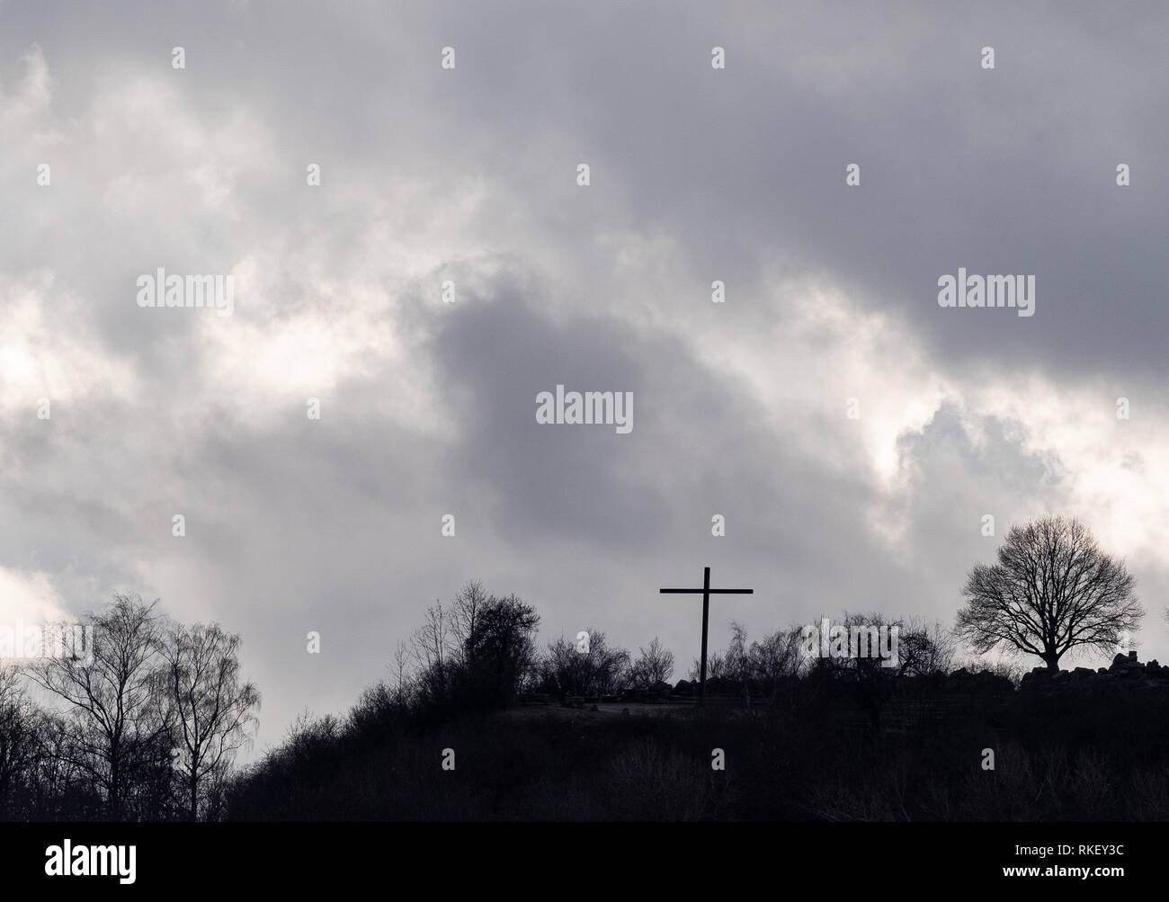 11 February 2019, Baden-Wuerttemberg, Stuttgart: Clouds pass over the summit cross of the Birkenkopf. Photo: Fabian Sommer/dpa Stock Photo