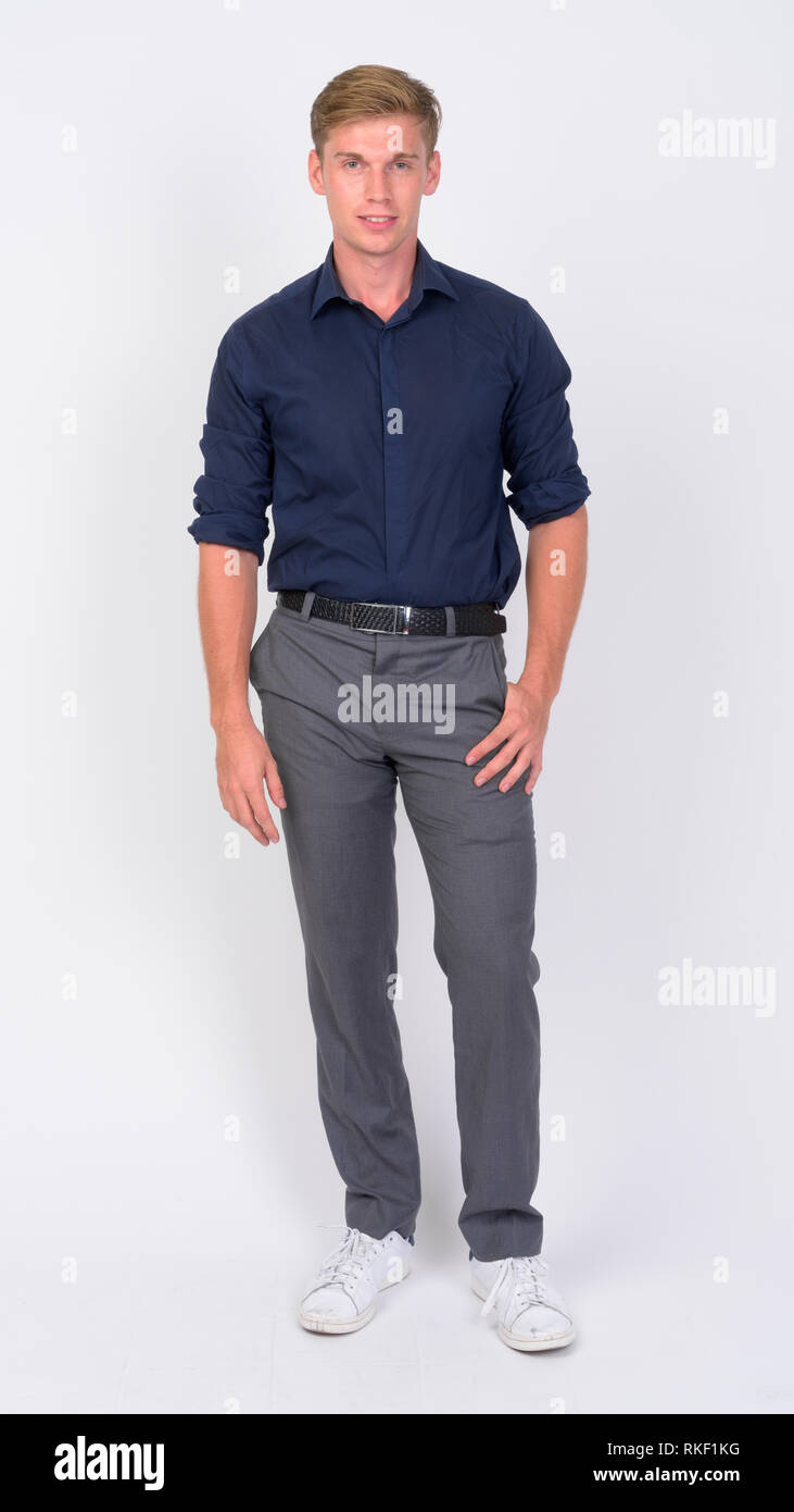 Full body shot of young handsome businessman with blond hair Stock ...