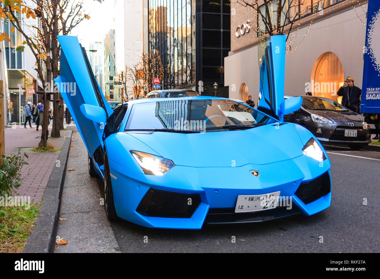 Light blue Lamborghini Aventador Roadster, high performance super car, with  doors open, parked in the Ginza famous shopping street in Tokyo Stock Photo  - Alamy
