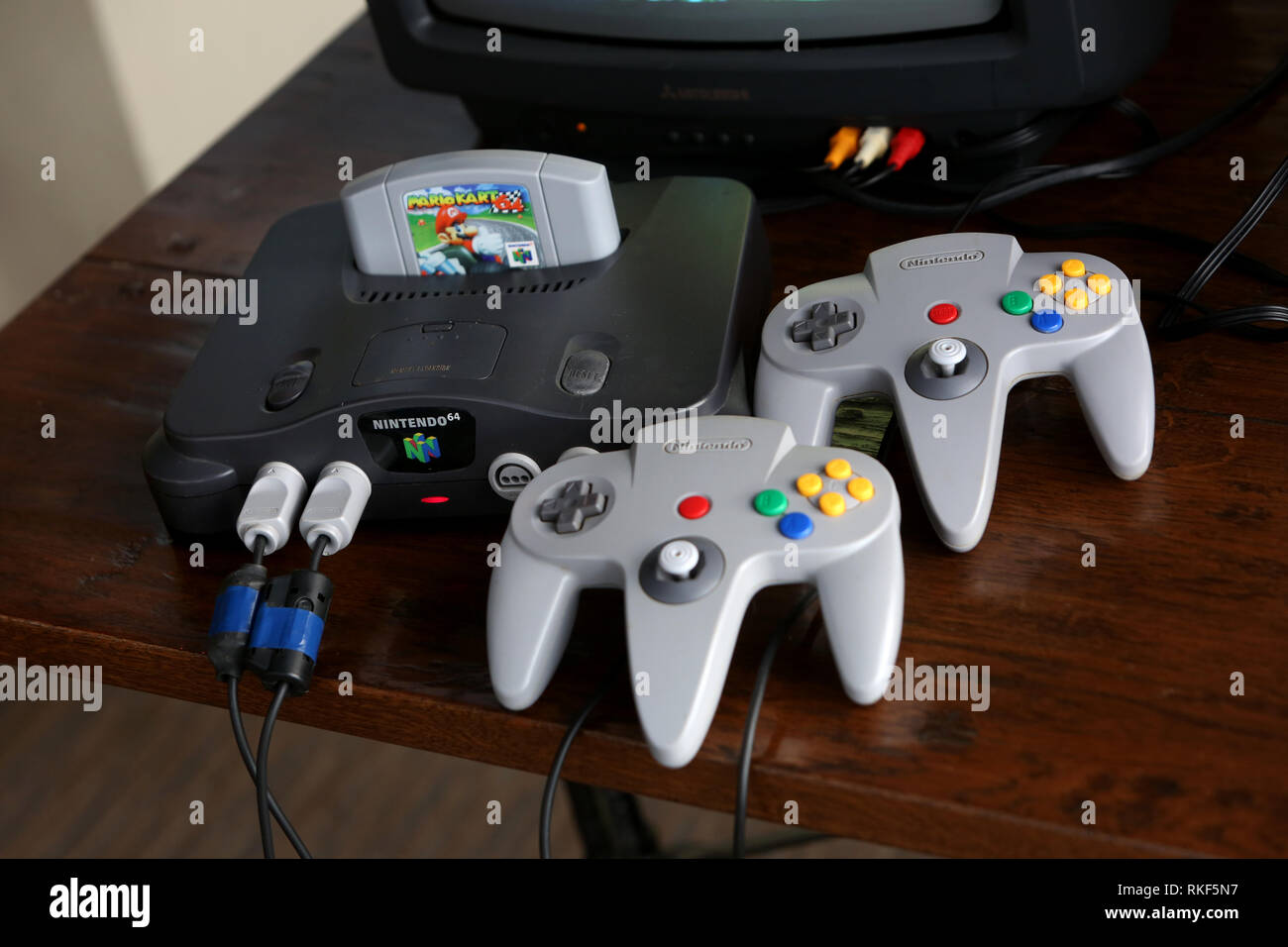 General views of the Nintendo 64 Games Console with controllers and Mario Kart 64 game in Bognor Regis, West Sussex, UK. Stock Photo