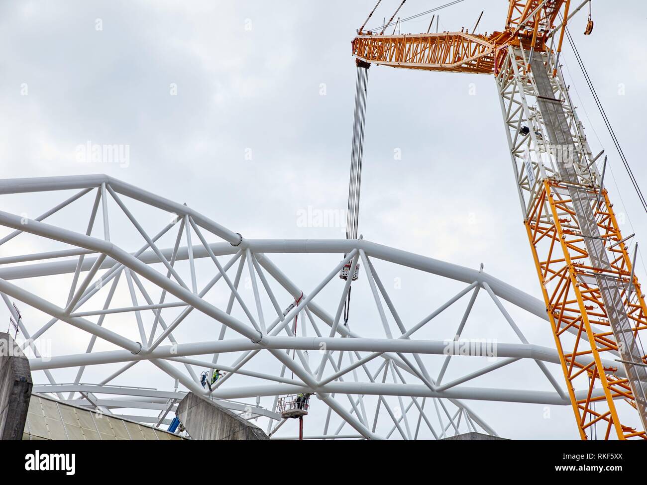 Giant crane supporting metal structure, Truss Placement, Anoeta Stadium Cover, Amara, Donostia, San Sebastian, Gipuzkoa, Basque Country, Spain Stock Photo