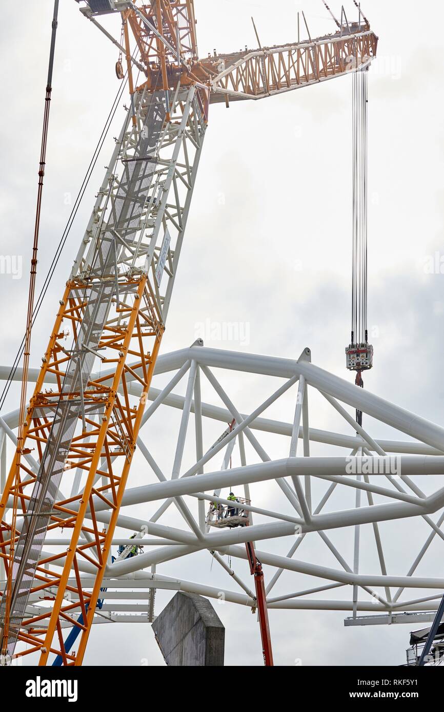 Giant crane supporting metal structure, Truss Placement, Anoeta Stadium Cover, Amara, Donostia, San Sebastian, Gipuzkoa, Basque Country, Spain Stock Photo