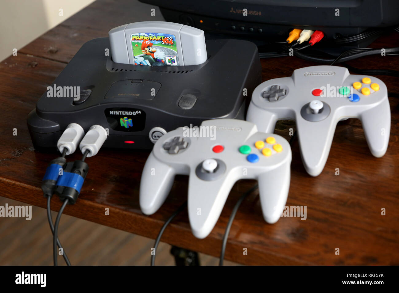 General views of the Nintendo 64 Games Console with controllers and Mario Kart 64 game in Bognor Regis, West Sussex, UK. Stock Photo