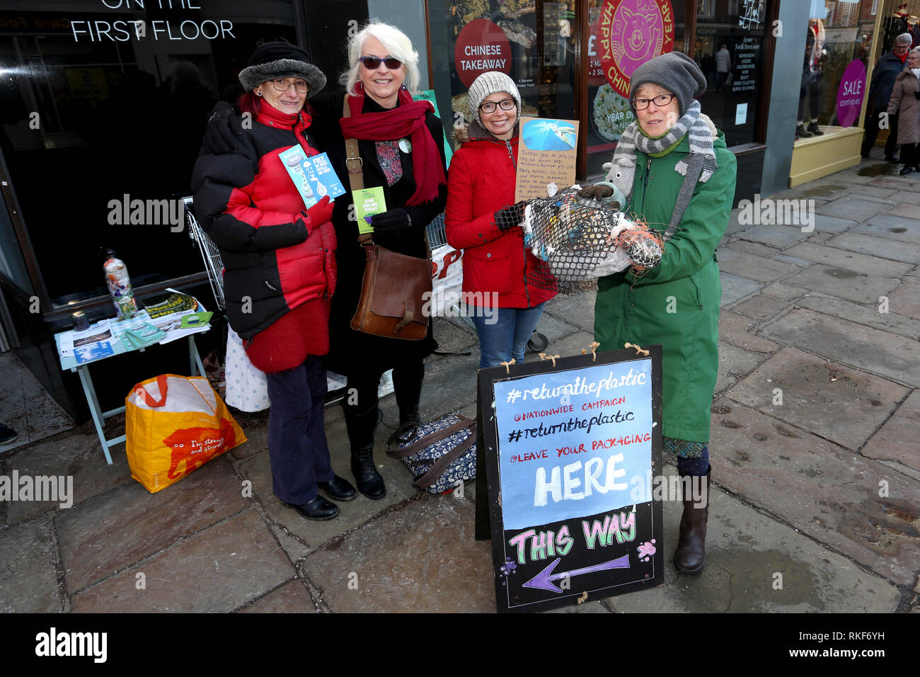 Climate change campaigners pictured protesting outside the Marks and Spencer store in Chichester, West Sussex, UK, over plastic and waste packaging. Stock Photo
