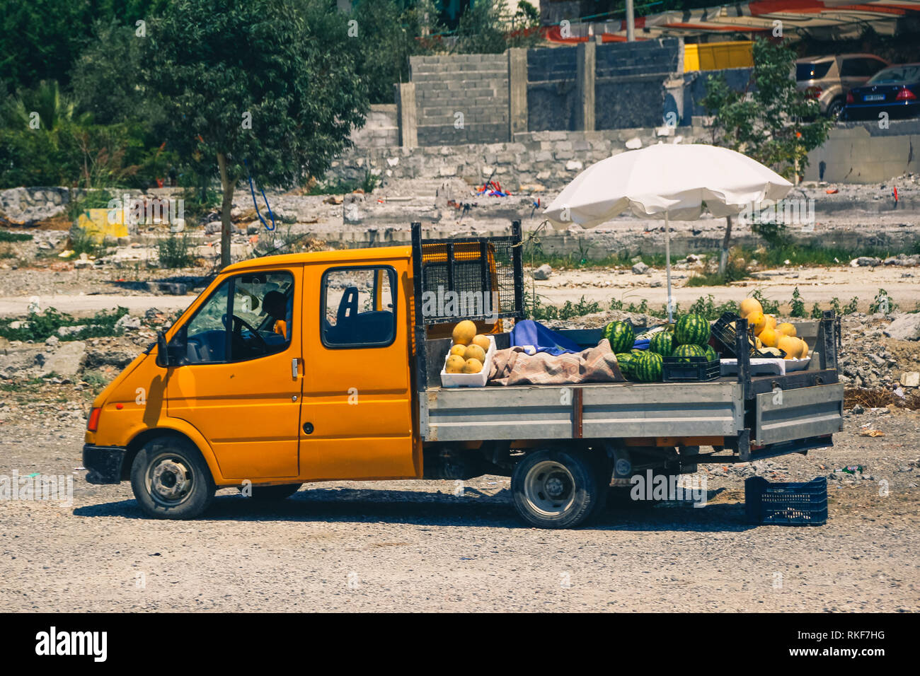 Street, car selling from a car, Albanian life, summer time. Stock Photo