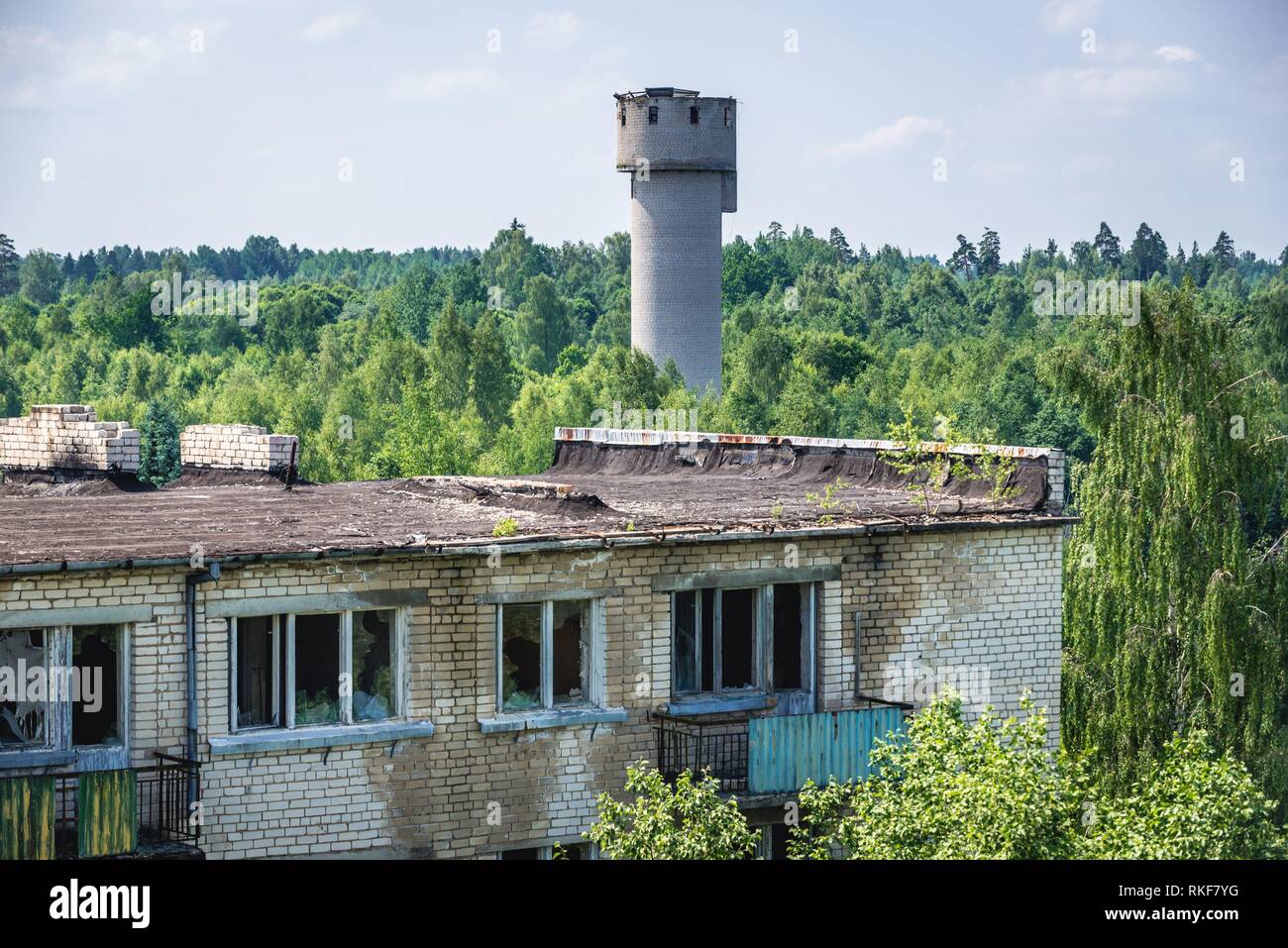 Water tower and roof of apartment houses in Skrunda-1 ghost town ...