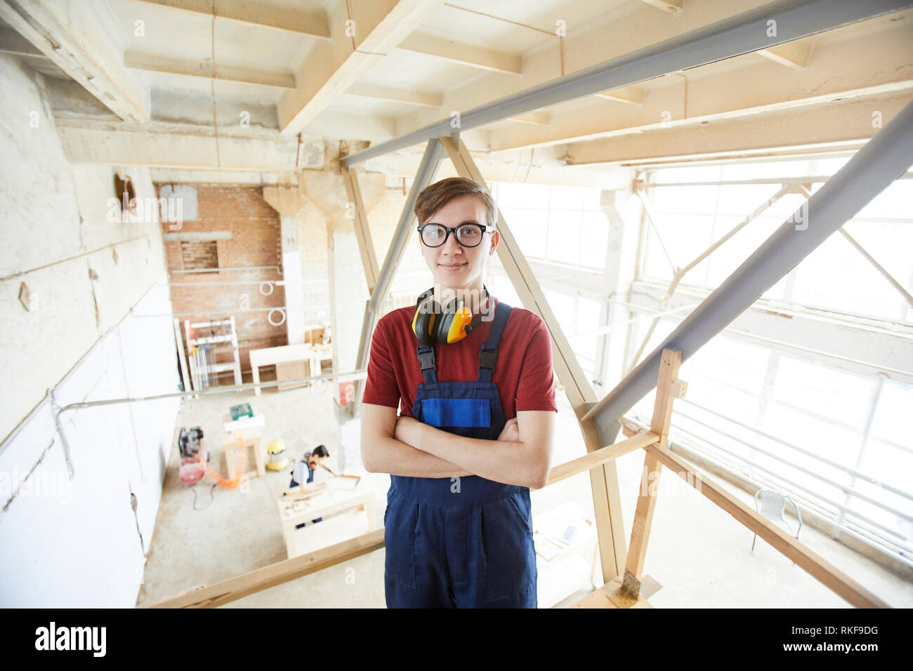 Young carpenter in glasses Stock Photo