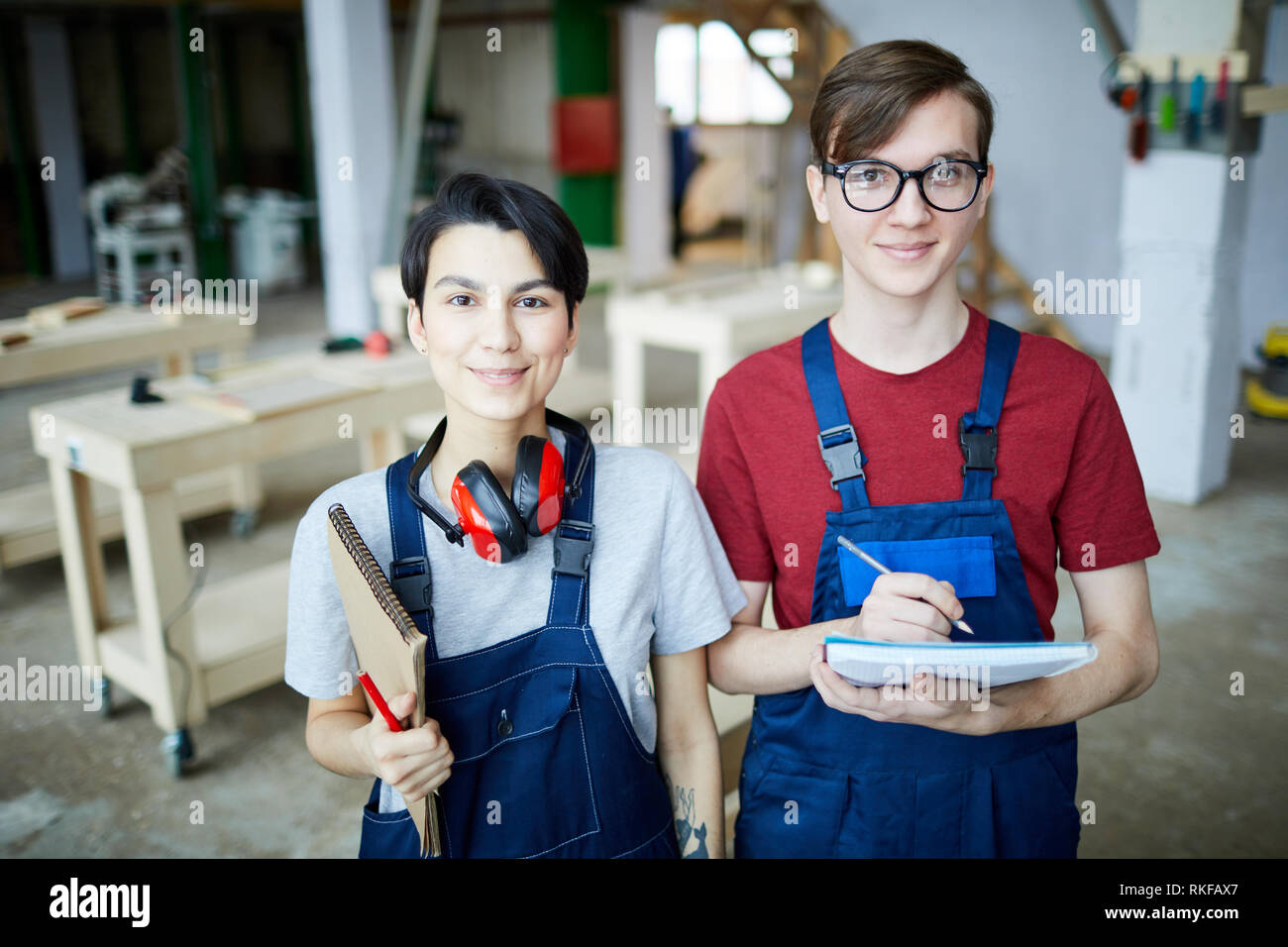 Carpentry students in workshop Stock Photo