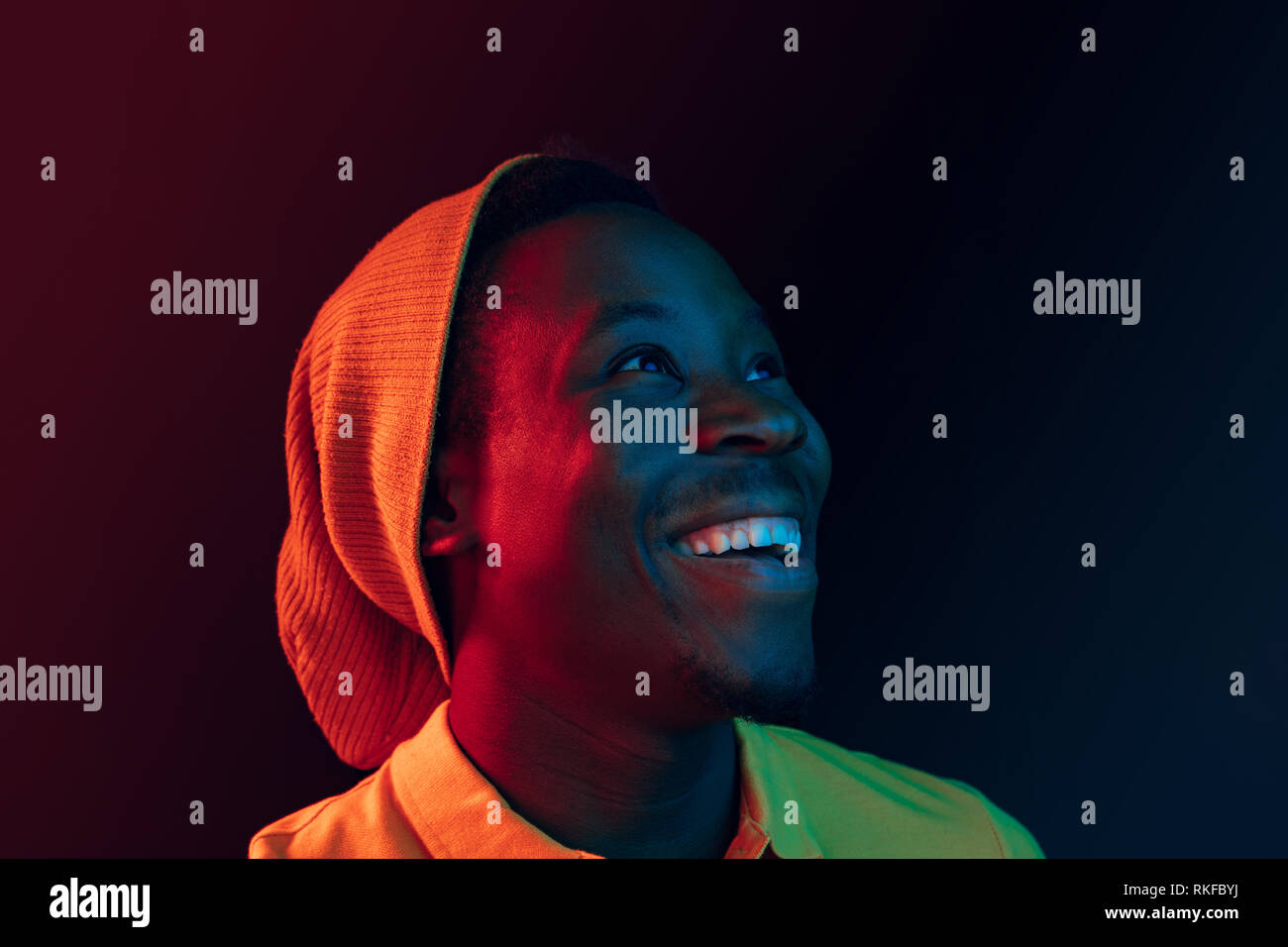 Close up portrait of a happy young african american man smiling on ...