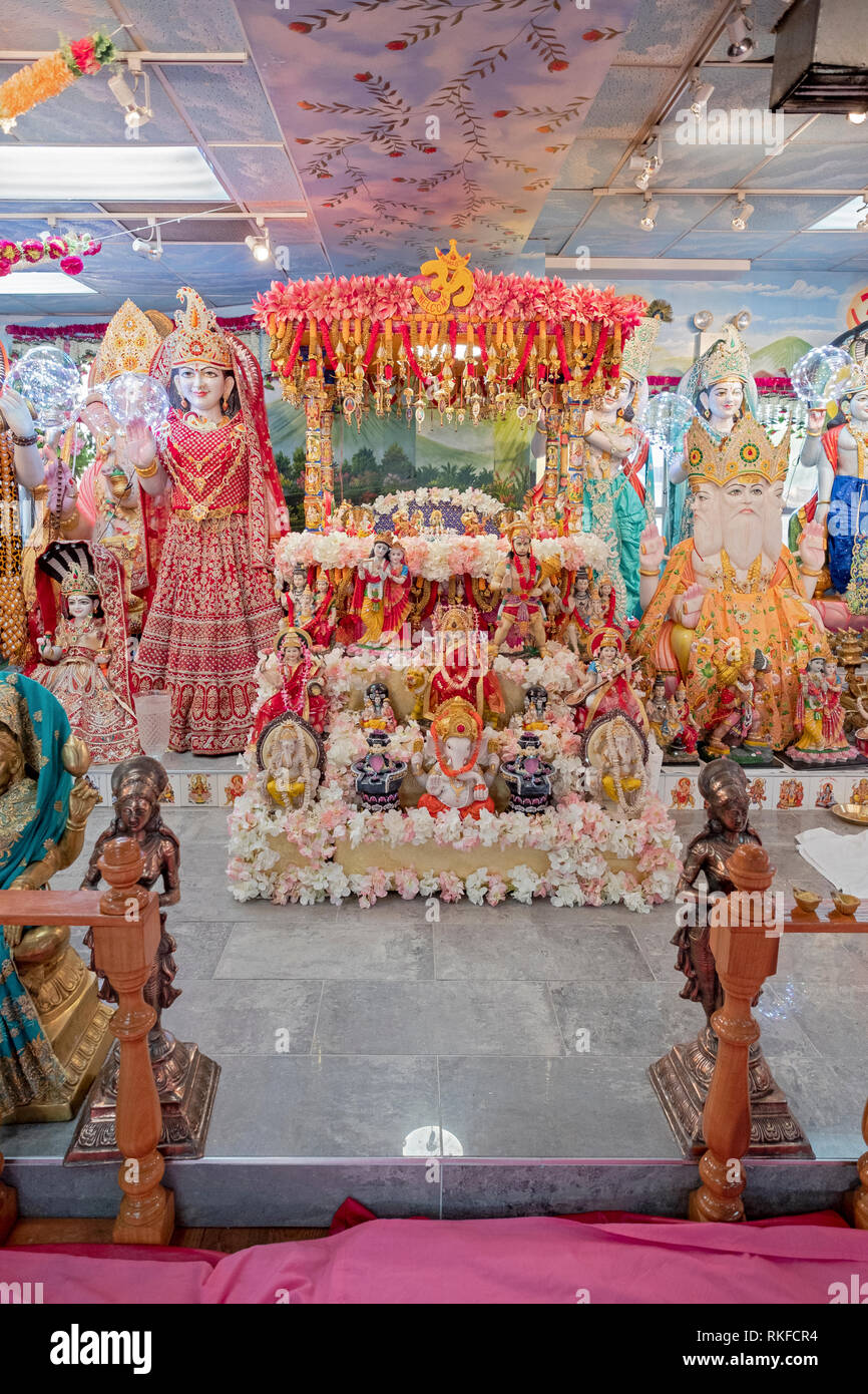 The altar with statues of deities at the DAYARAM MANDIR, a Hindu temple in Jamaica, Queens, New York City. Stock Photo