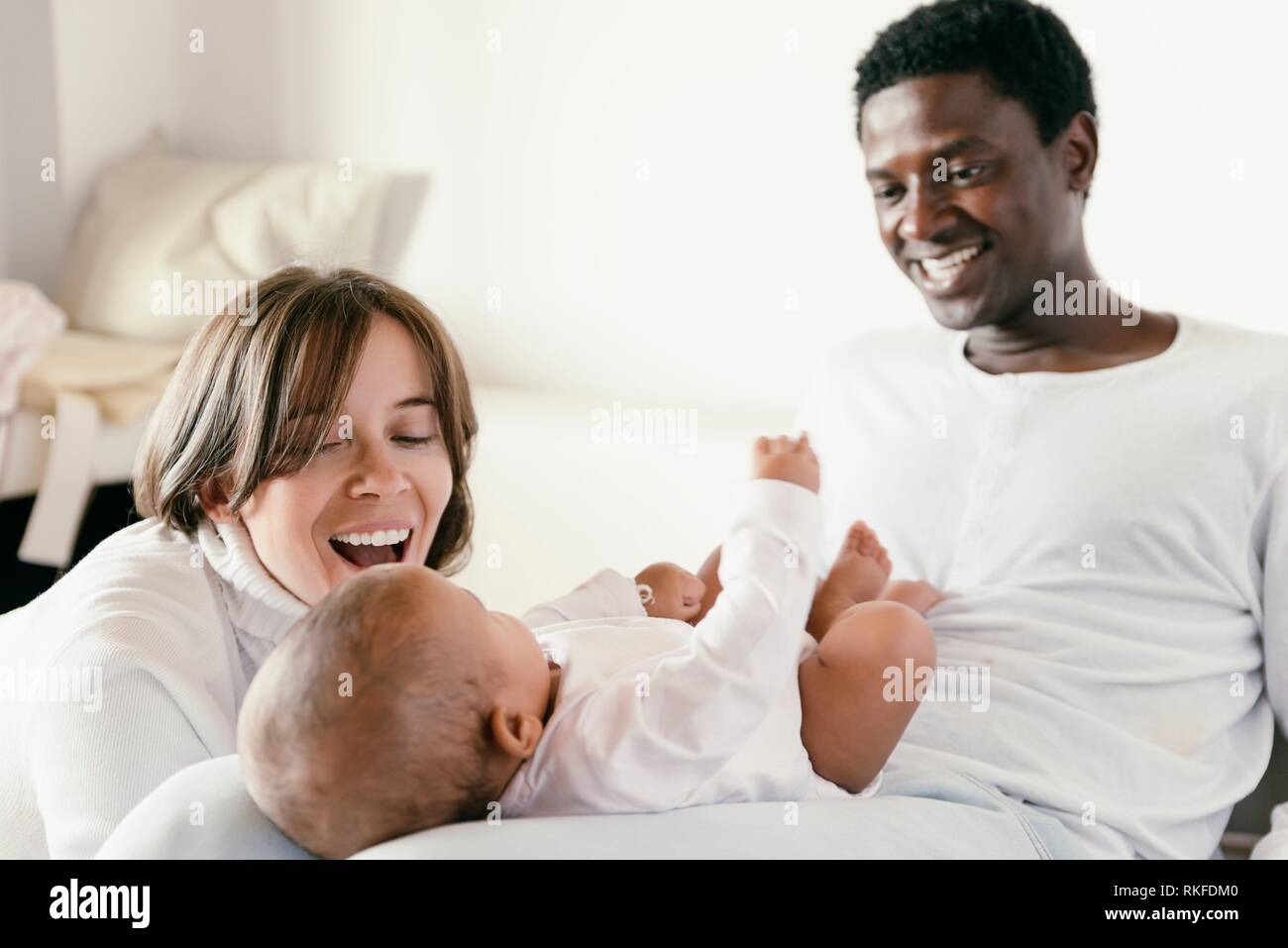 Family with newborn baby at home hi-res stock photography and images ...