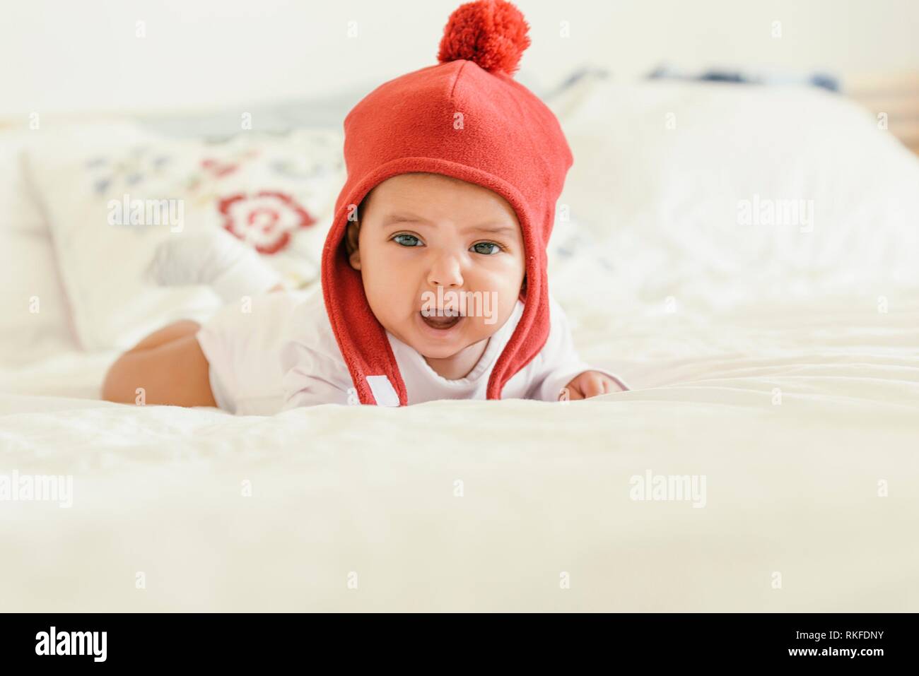 Baby girl in crib hires stock photography and images Alamy