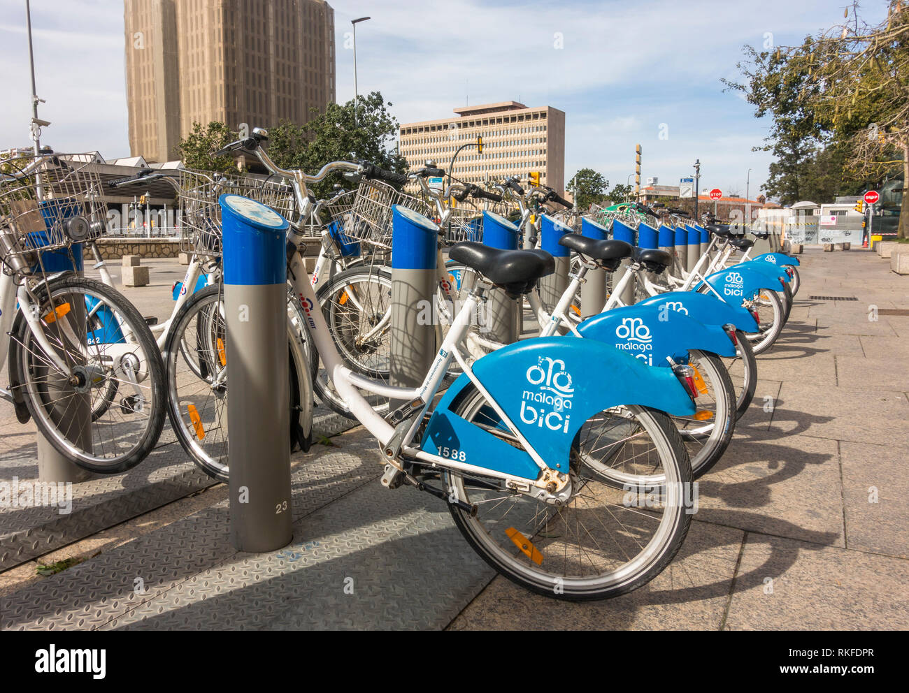 Malaga spain, Row of blue Malaga Bici, public bicycles renting system station in Malaga, Andalusia, Spain. Stock Photo