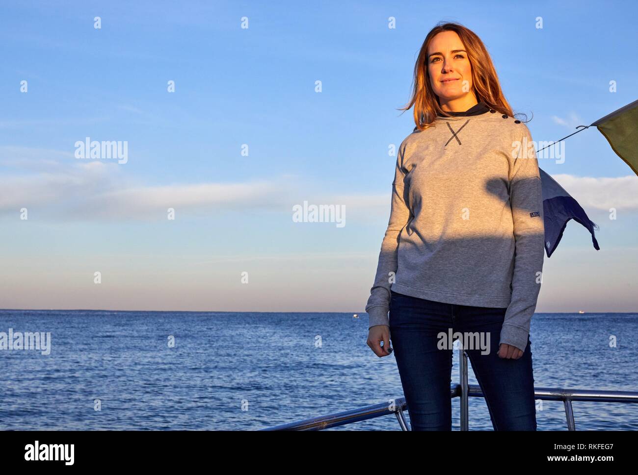 Adult woman on a boat trip to Santa Clara Island, Donostia, San Sebastian, Gipuzkoa, Basque Country, Spain, Europe Stock Photo