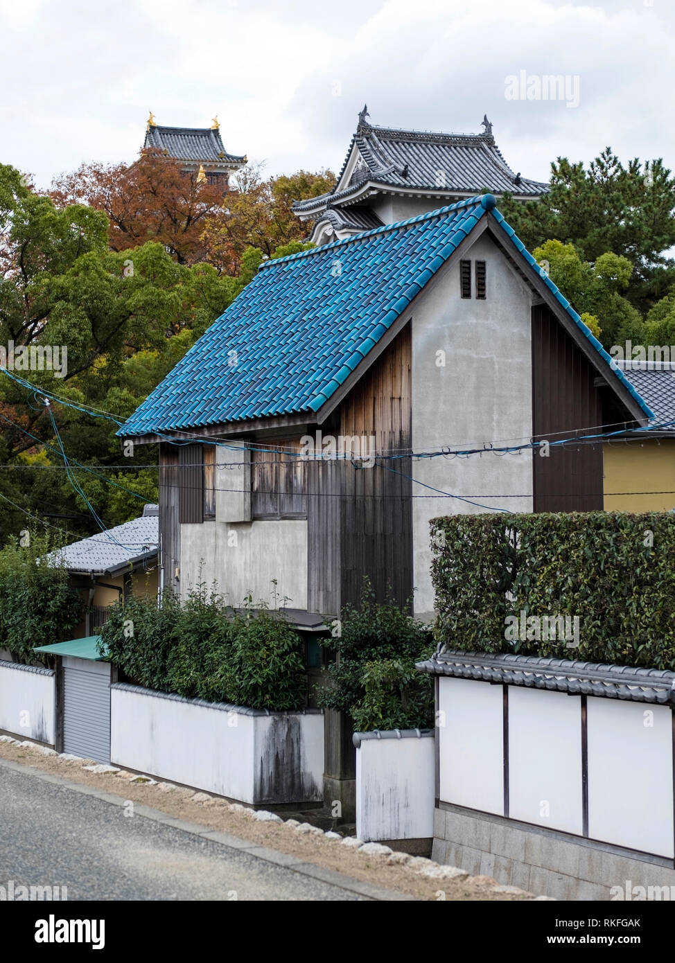 Traditional Japanese house with enameled blue roof tiles, Okayama, Japan Stock Photo