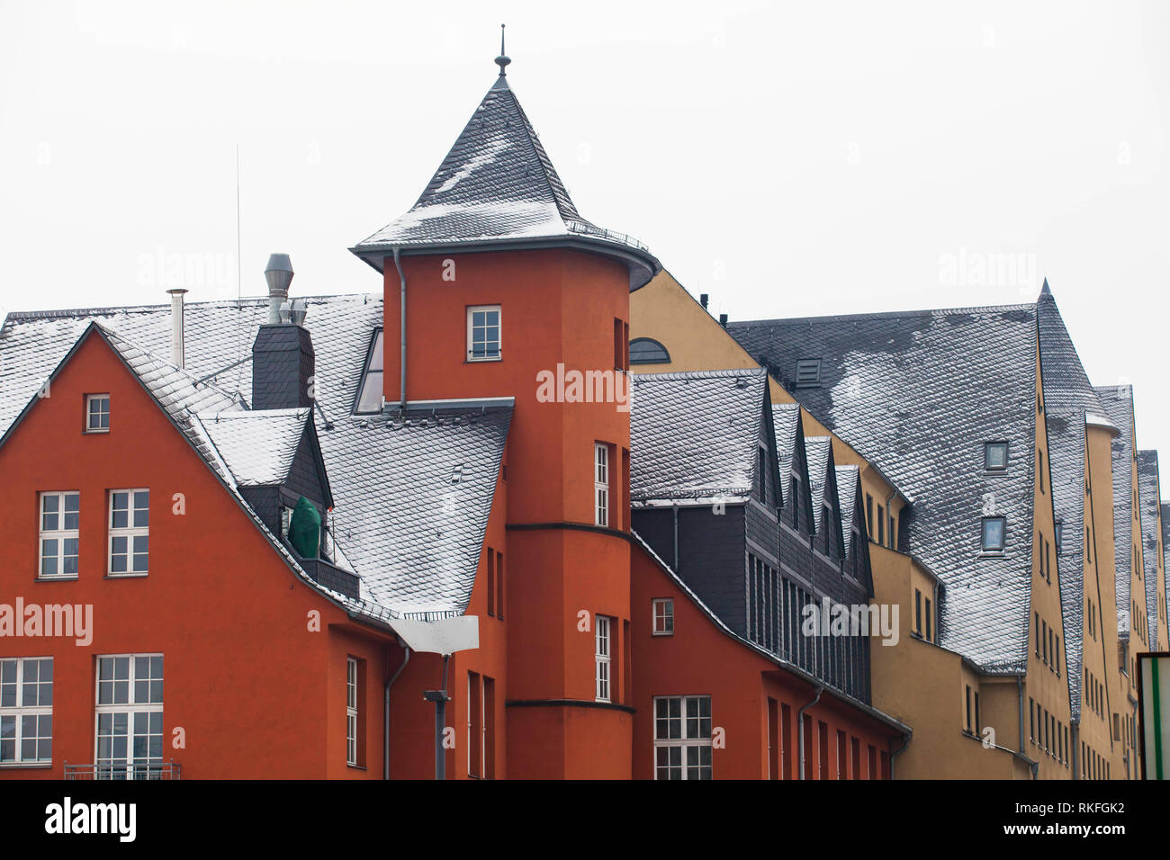 snow-covered roofs of the building Rheinkontor and the old storehouse at the Rheinau harbor, Cologne, Germany.   schneebedeckte Daecher des Rheinkonto Stock Photo