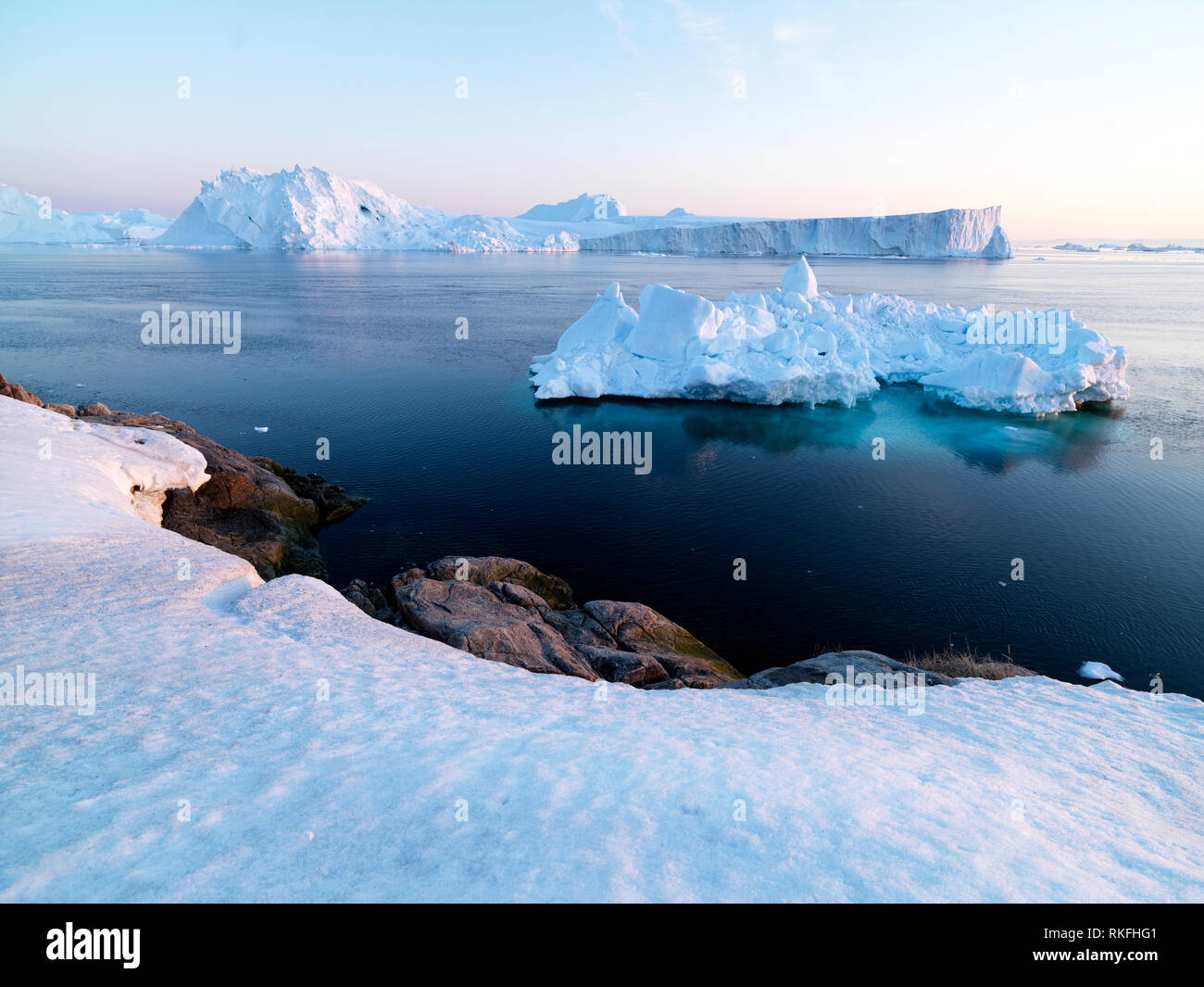 Arctic Icebergs on arctic ocean in Greenland Stock Photo