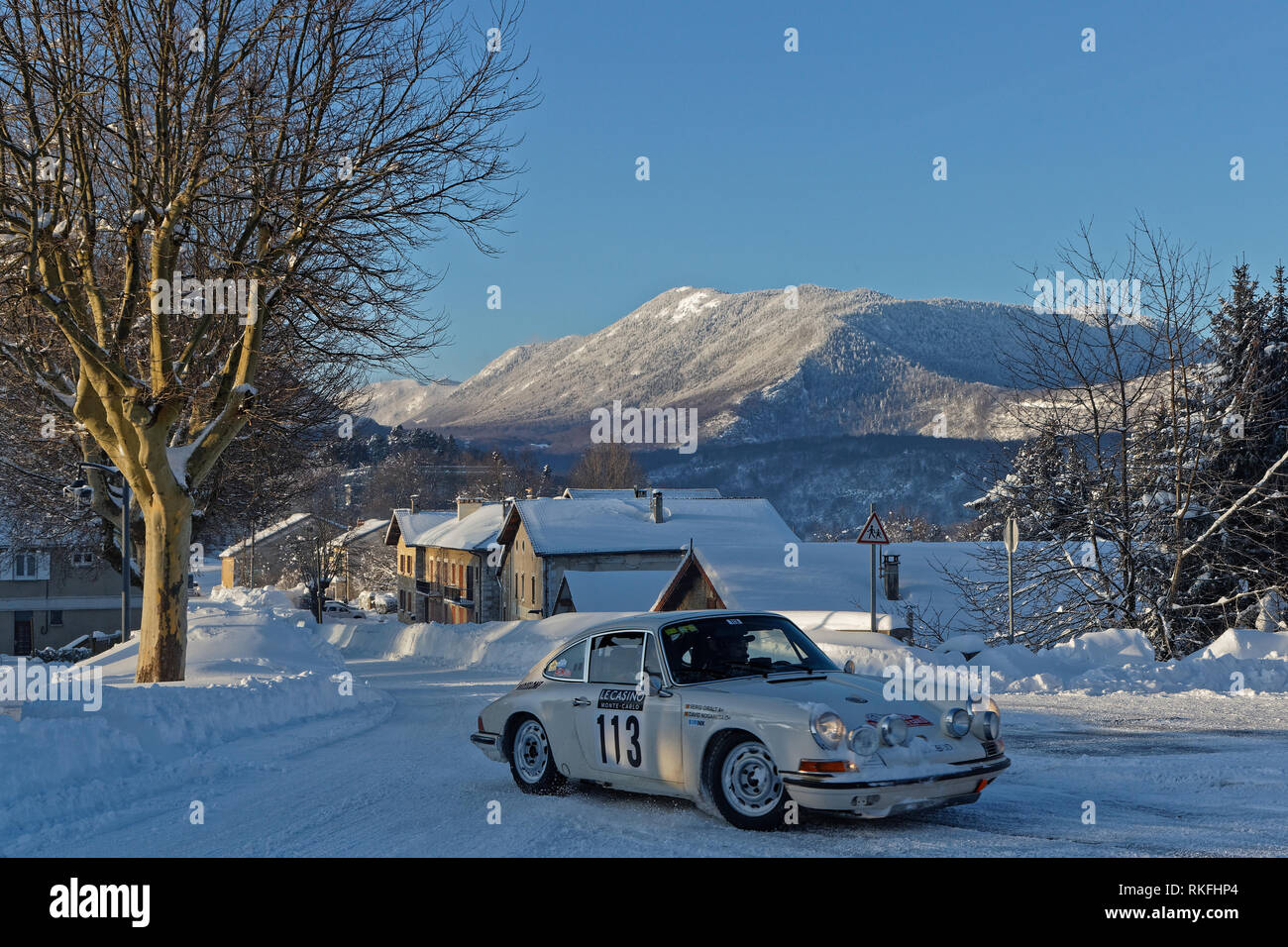VASSIEUX, FRANCE, February 4, 2019 : Rally trough the village in winter. Rallye Historique is reserved to those cars which have participated in the Ra Stock Photo