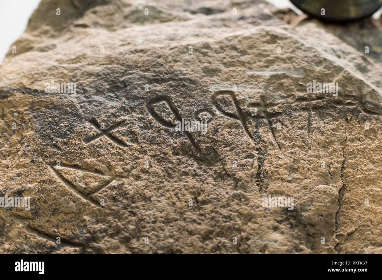 Badajoz, Spain: Southwestern writing inscription belonging to Capote Warrior Stela, Higuera La Real. Badajoz Archeological Museum. Stock Photo