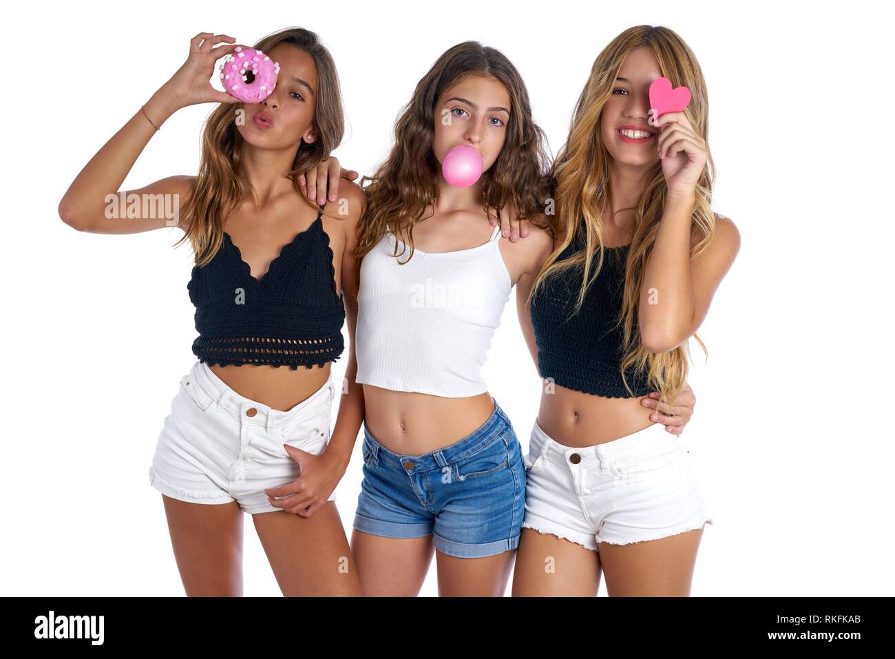 Best friends three teen girls group on white background. Stock Photo