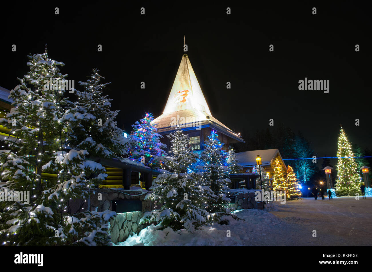 Santa Claus Village in Finland surrounded by Christmas trees Stock Photo