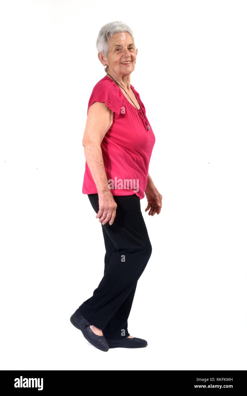 Elderly woman walking Stock Photo Alamy