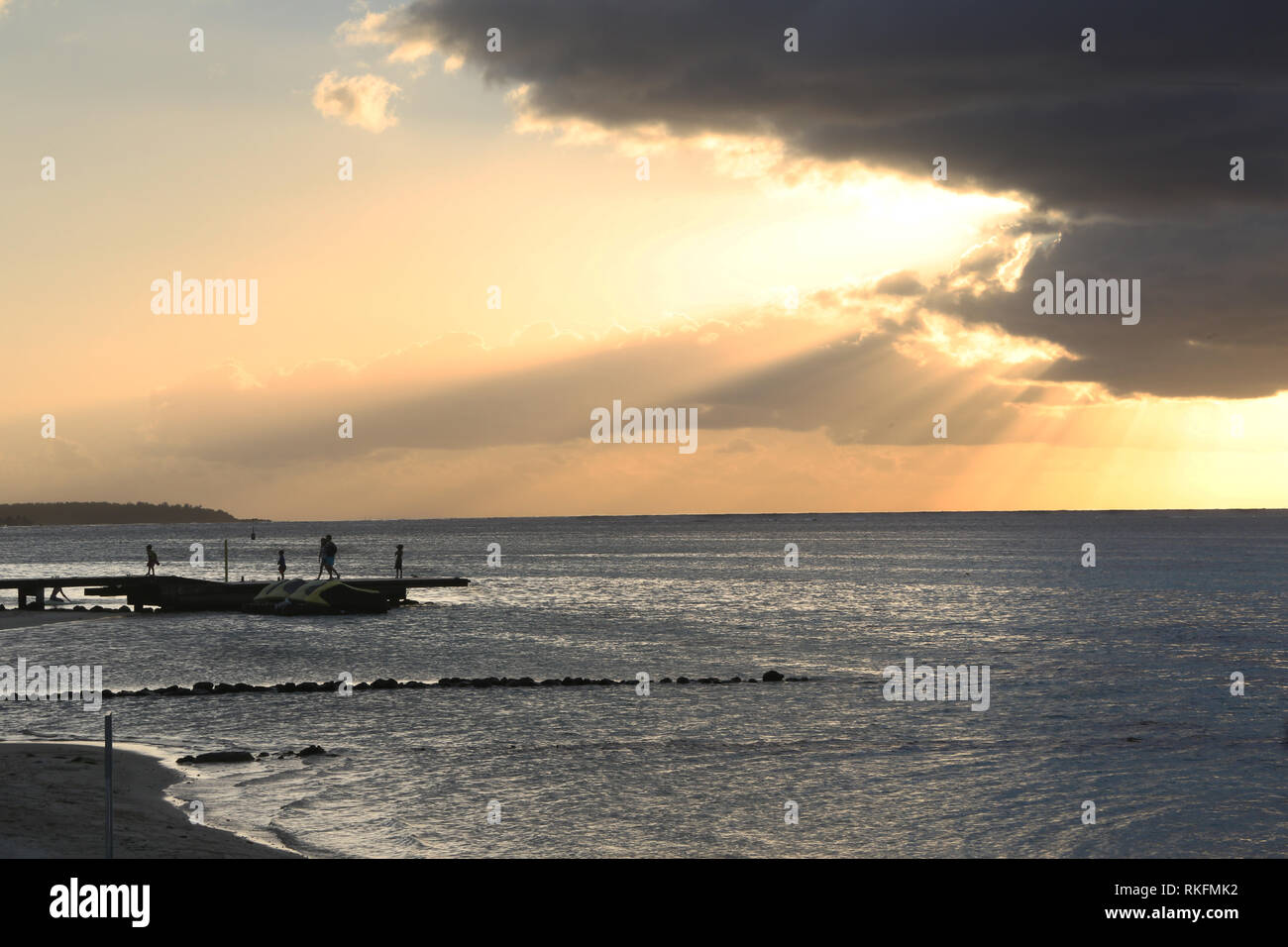 Cloudy sunset in Moorea, French Polynesia Stock Photo