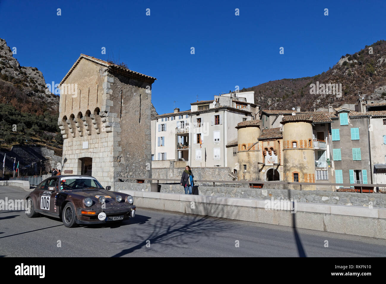 ENTREVAUX, FRANCE, February 5, 2019 : Rally goes trough the medieval village. Rallye Historique is reserved to those cars which have participated in t Stock Photo
