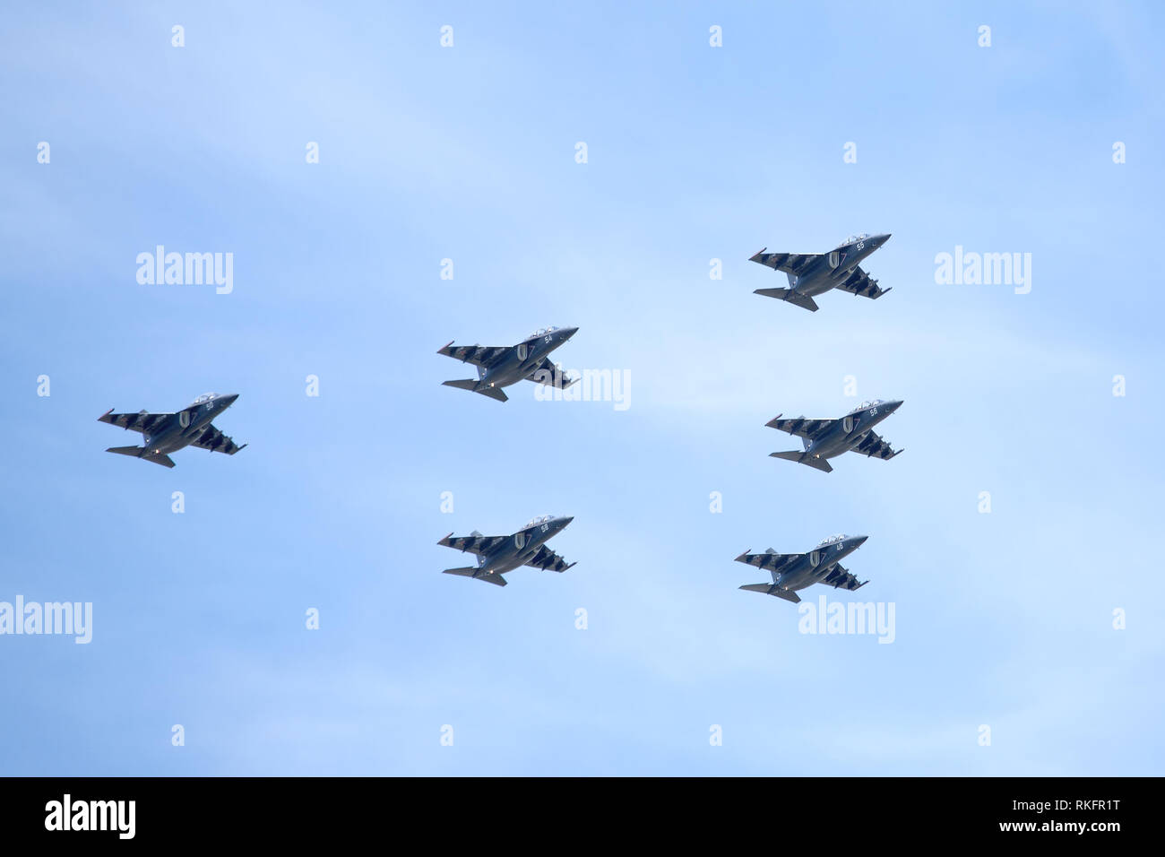 Russia, Moscow - May 9, 2015:  Six Russian military trainer subsonic attack planes SU-25 UTG Rook in flight against the blue sky on parade on May 9, 2 Stock Photo