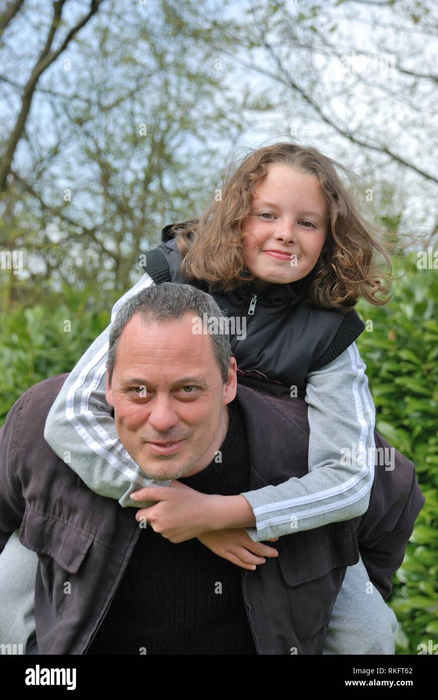 Complicity between father and daughter. Stock Photo