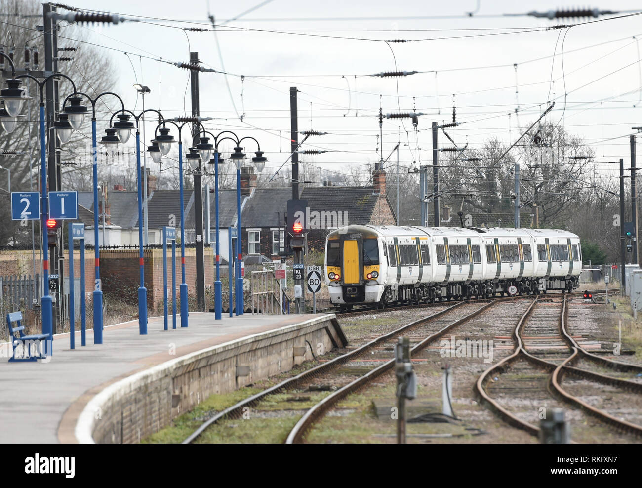 A train carrying Queen Elizabeth II leaves King's Lynn railway station ...