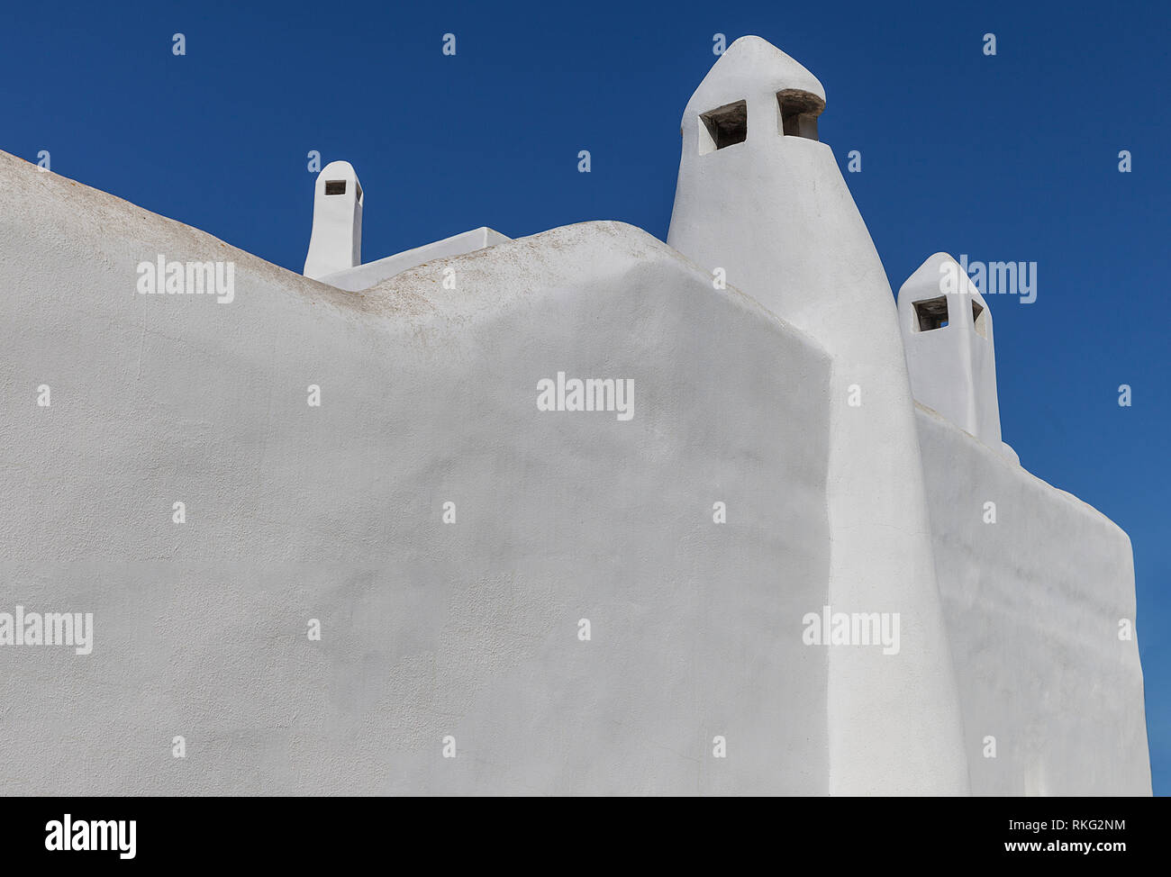Aegean   Chimneys.  Isolated .Aegean Chimneys. Cyclades island Architecture .Stock Image Stock Photo