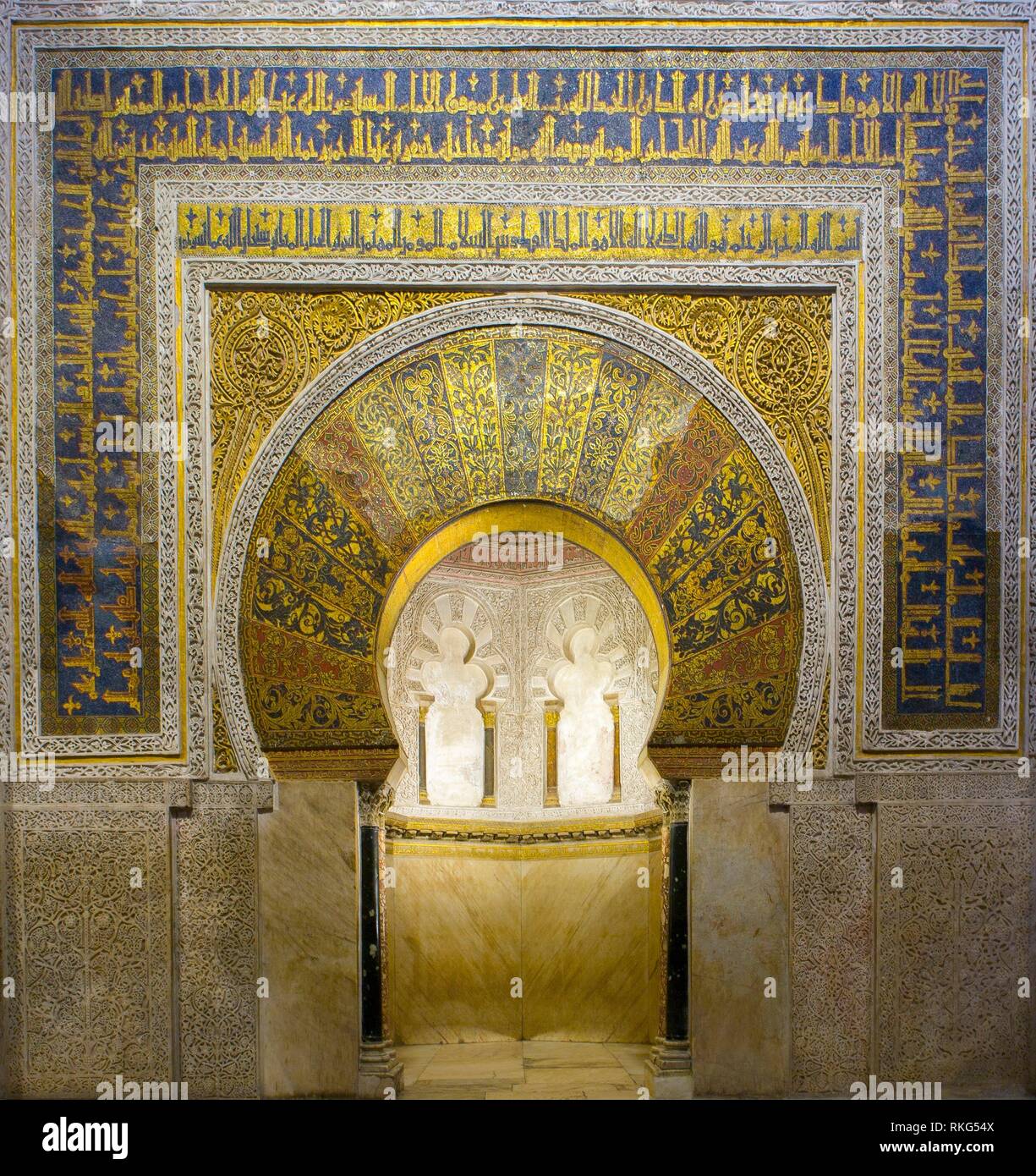 Richly gilded prayer niche or Mihrab of Cordoba Mosque. Andalusia, Spain. Stock Photo