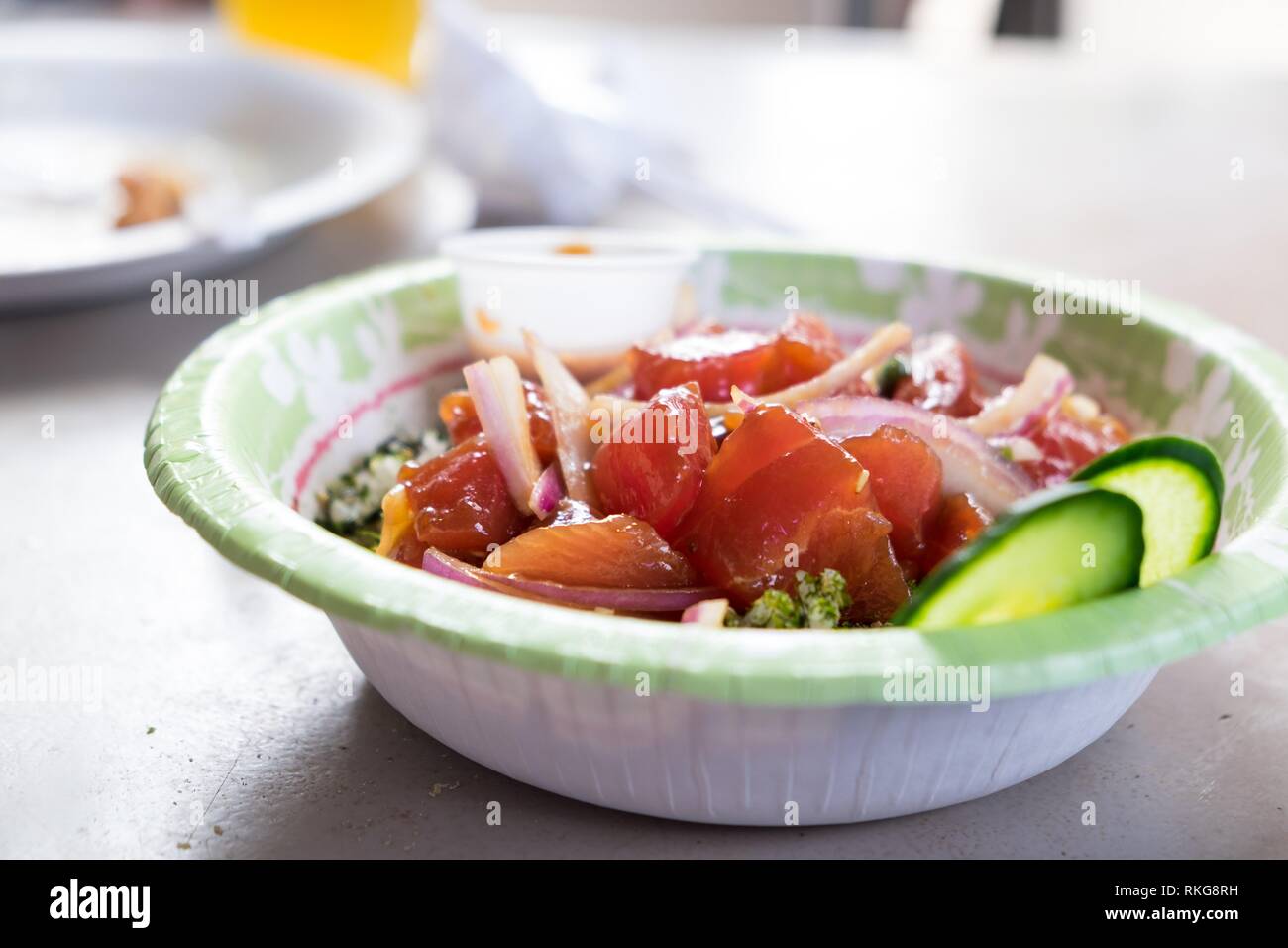 Raw fish poke bowl from a food truck in tropical Oahu Hawaii featuring