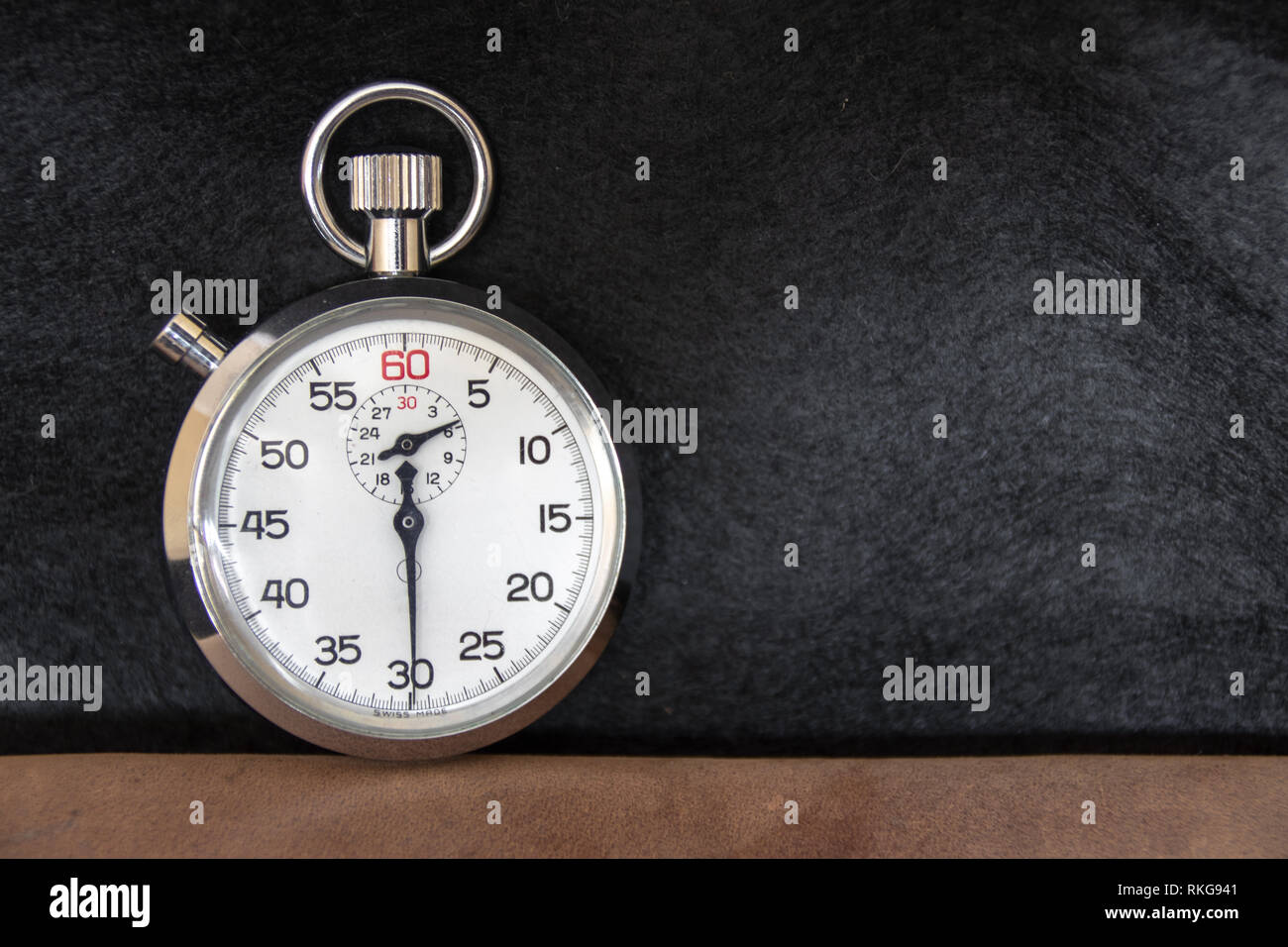 Classic stopwatch on black background Stock Photo Alamy